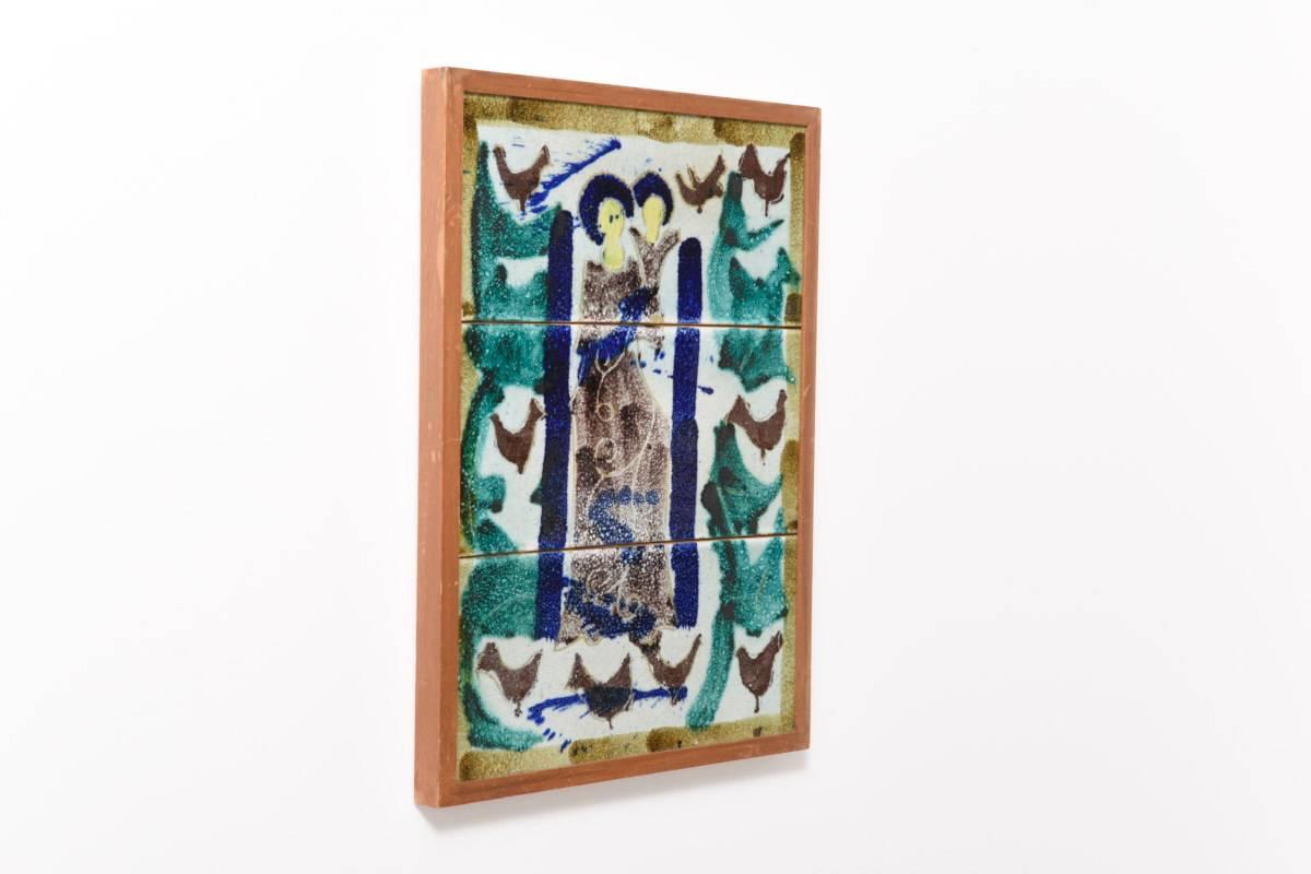 Beautiful depicting of a mother and child on tiles, painted and glazed in the following colors, cobalt blue, green, brown and white, framed with wood, 1960s.

In style of Jacques Innocenti for Vallauris.