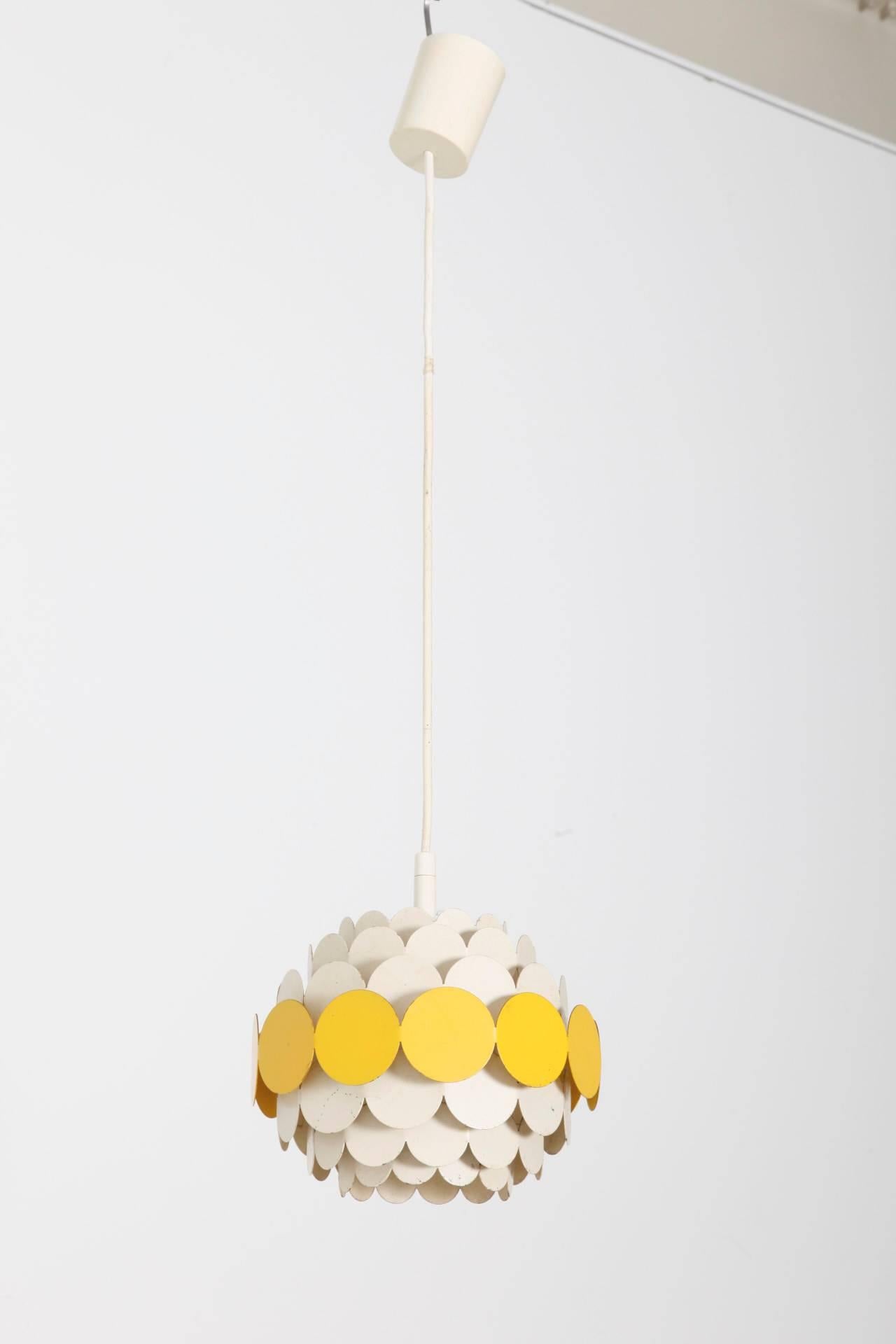 A very nice 1950s pendant, the special construction creates a soft atmospheric lighting in the living room or kids room.