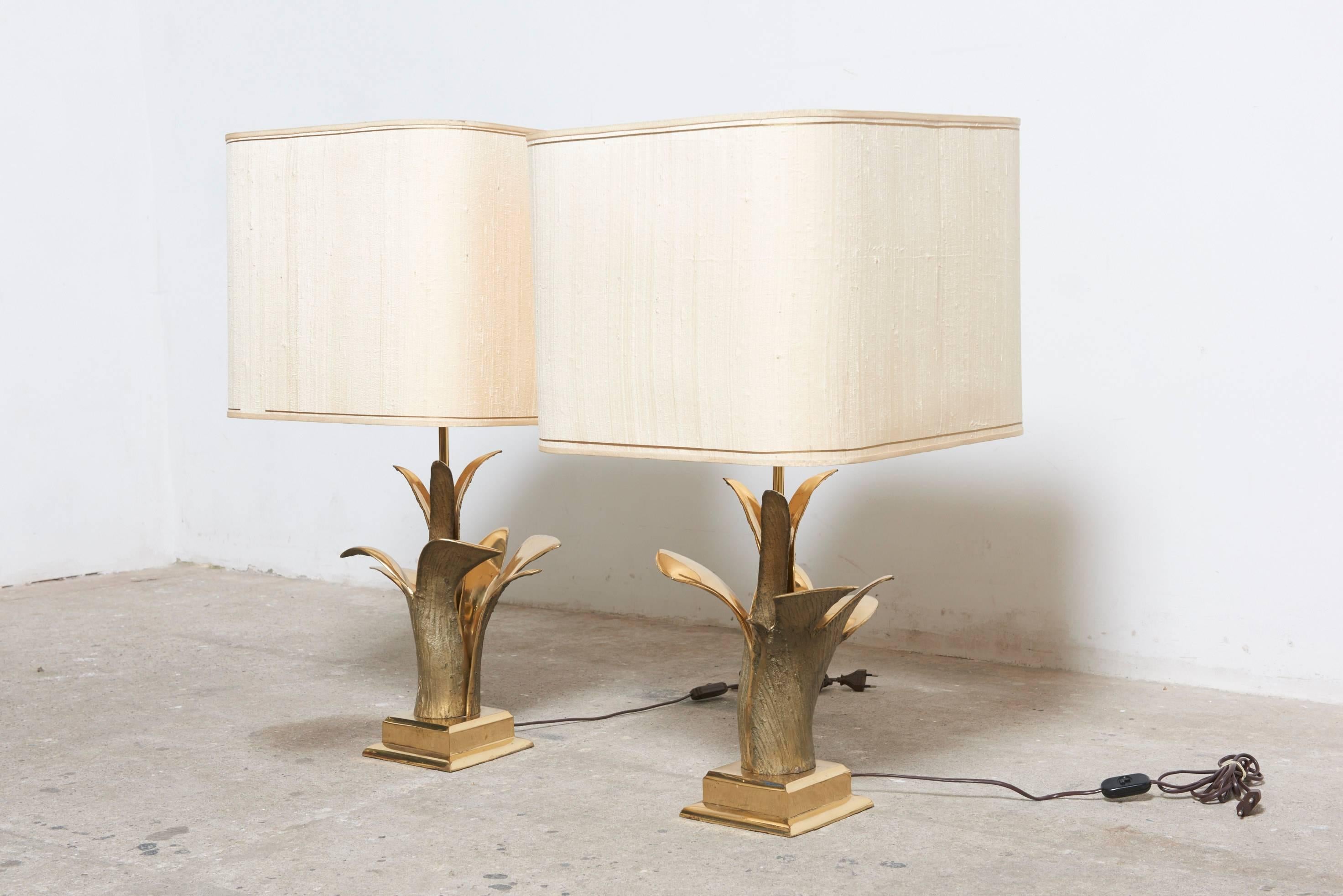 A pair of Palm leaves table,desk lamps in gilded bronze and original handmade fabric shades.


