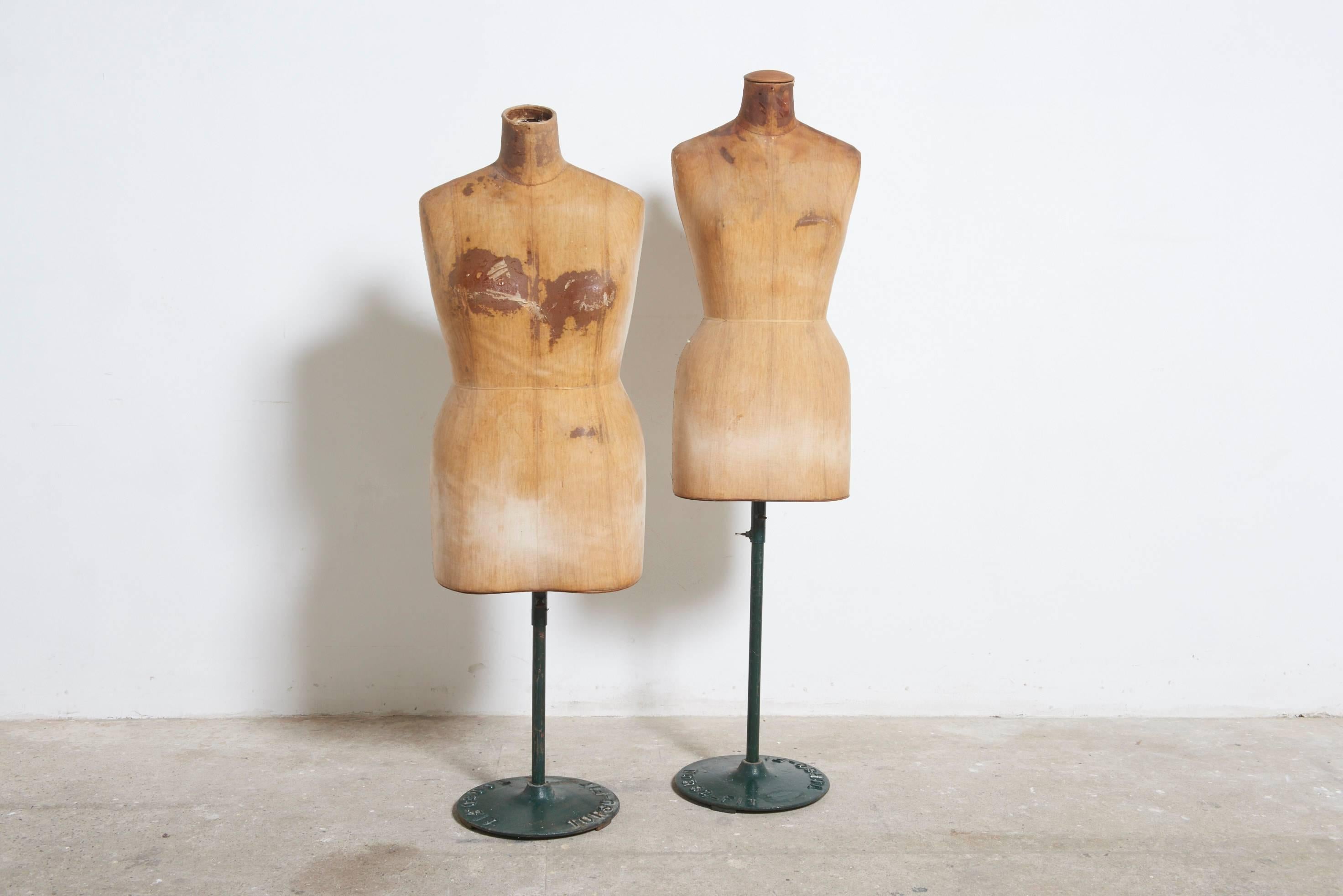 These dressmaker mannequins are raised on a cylindrical lacquered green metal pedestal. 

Whether used for the creation and alteration of garments, draped fabrics pinned in to the torso to become a dress, blouse, or tuxedo it also makes for a
