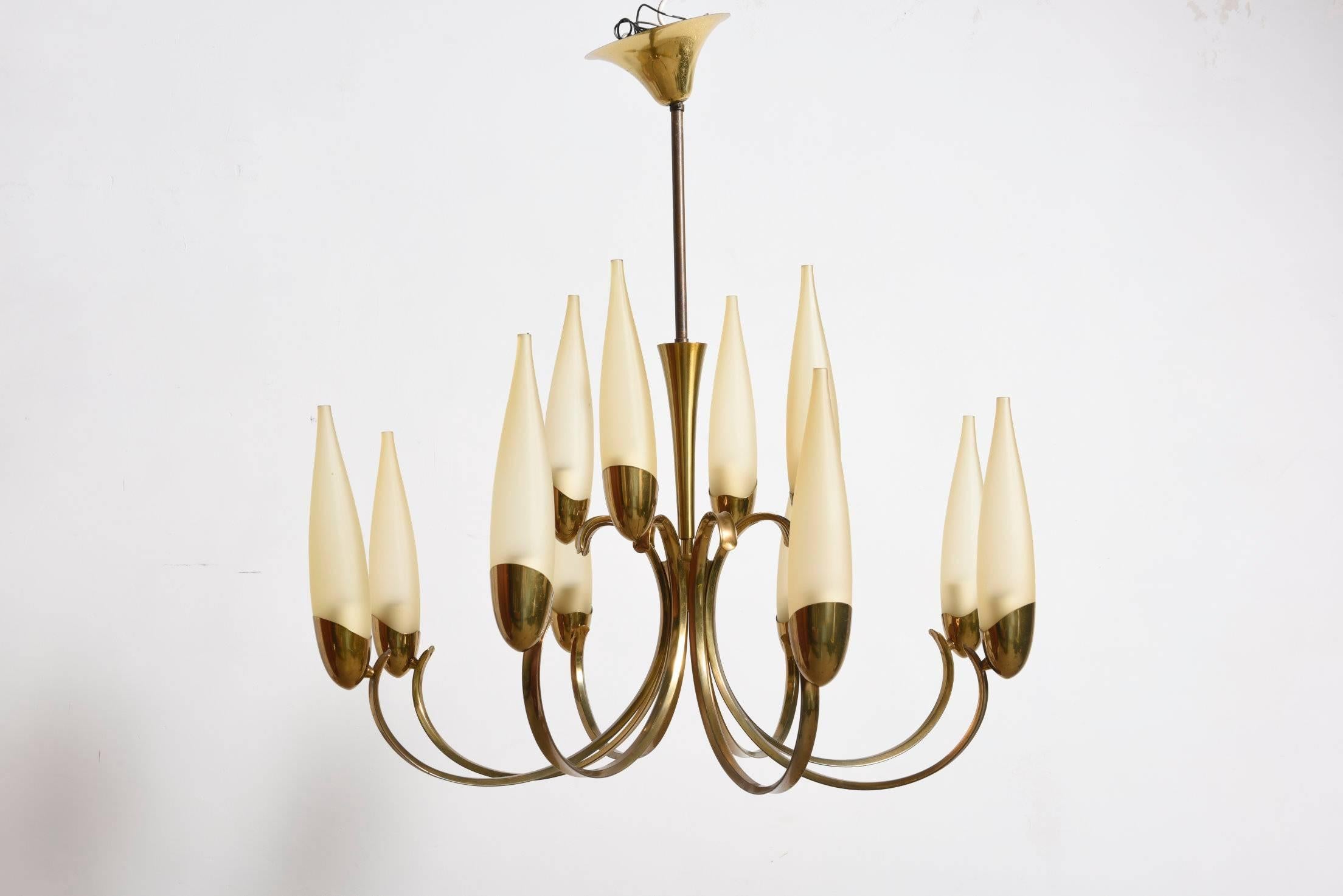 A spectacular brass two-tier chandelier with twelve champagne colored glass shades, 1950s.