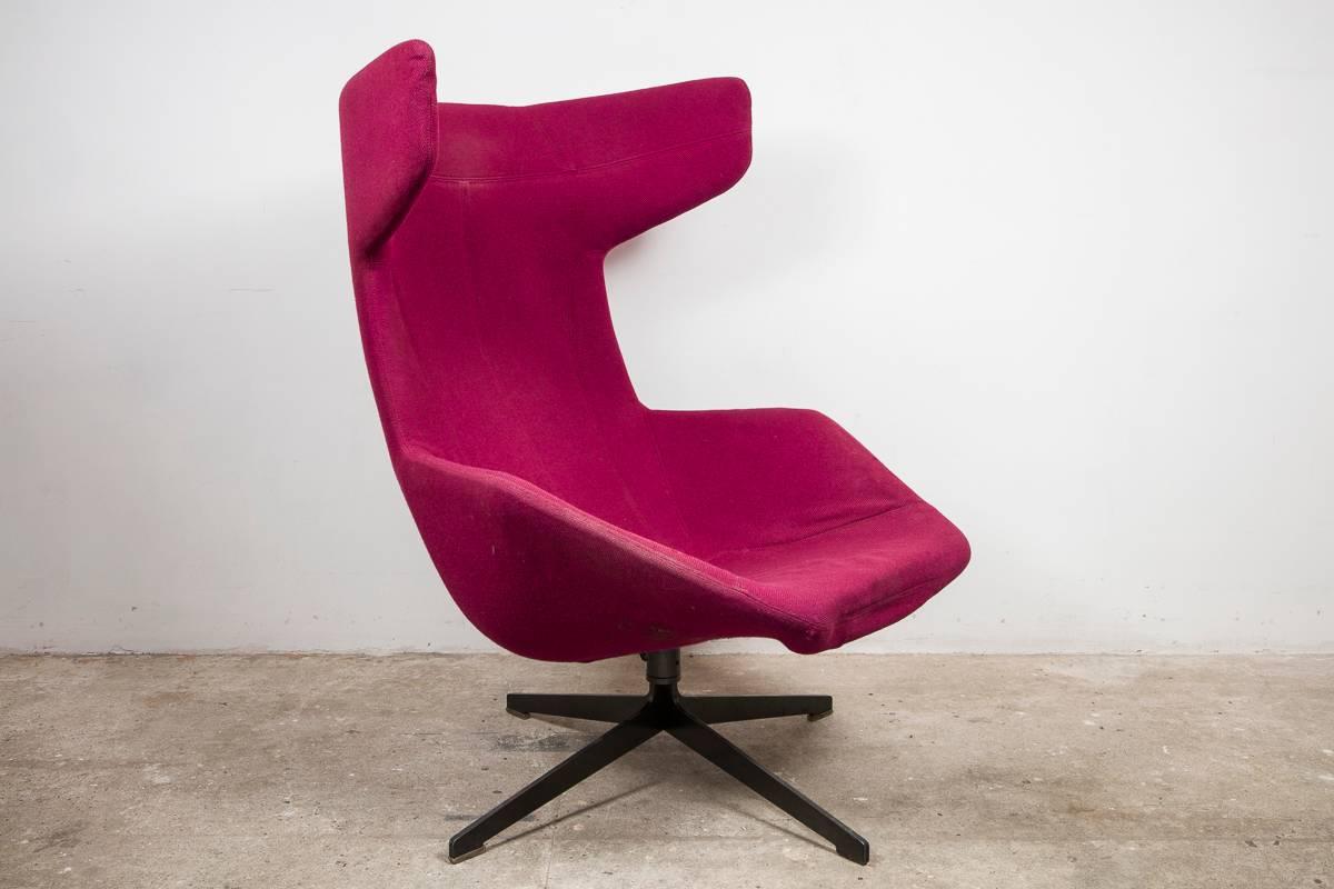 A high back lounge armchair designed in 2002 for Moroso by Alfredo Haberli, Italy
On the outside it's all precise, orderly geometry, inside, it's softness, bright color and exuberantly feminine.
It finds itself upholstered with a zip running the
