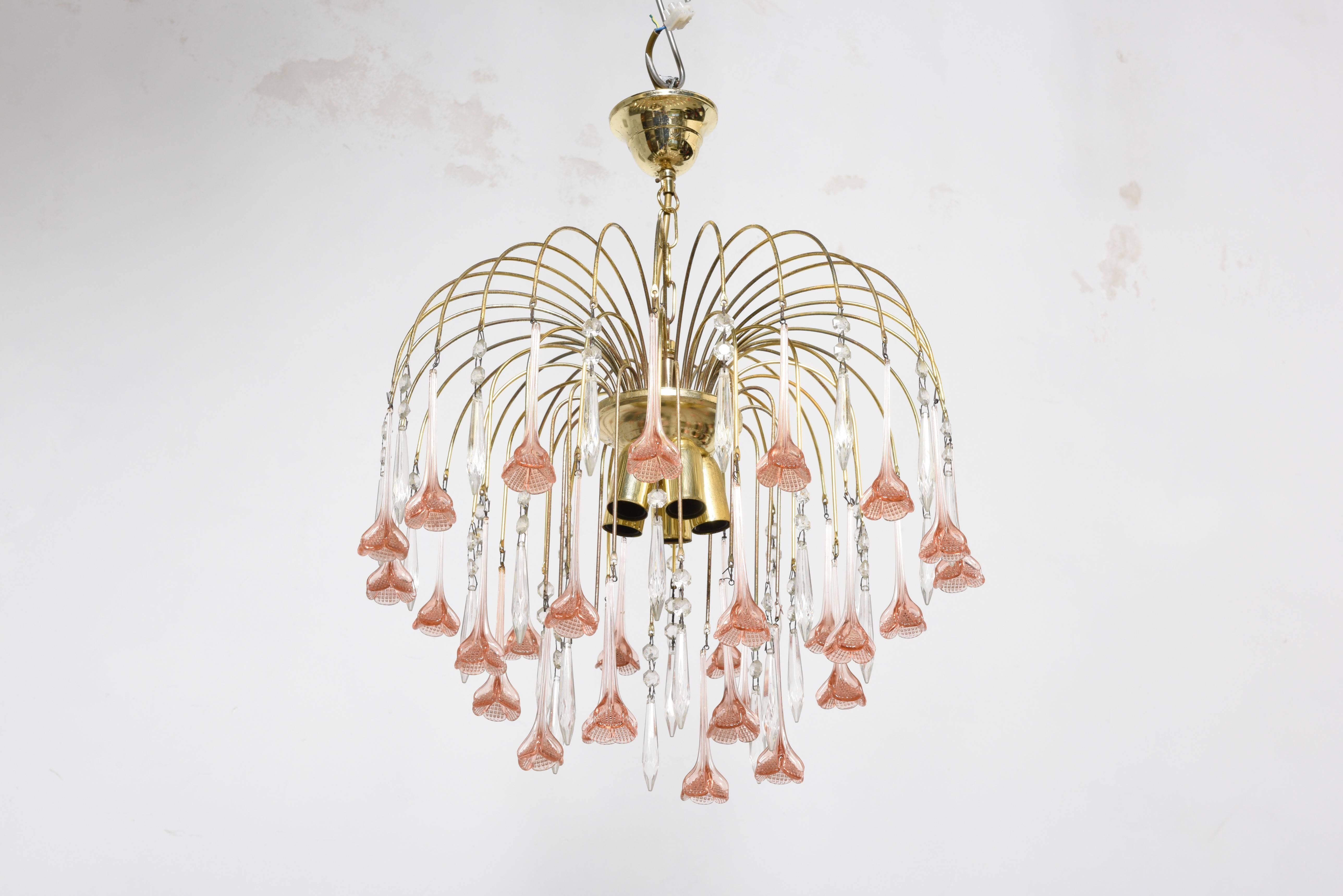Very elegant and great quality, vintage midcentury chandelier.
This piece has a brass frame with clear Murano crystals and pink blossoms.
In good working condition.