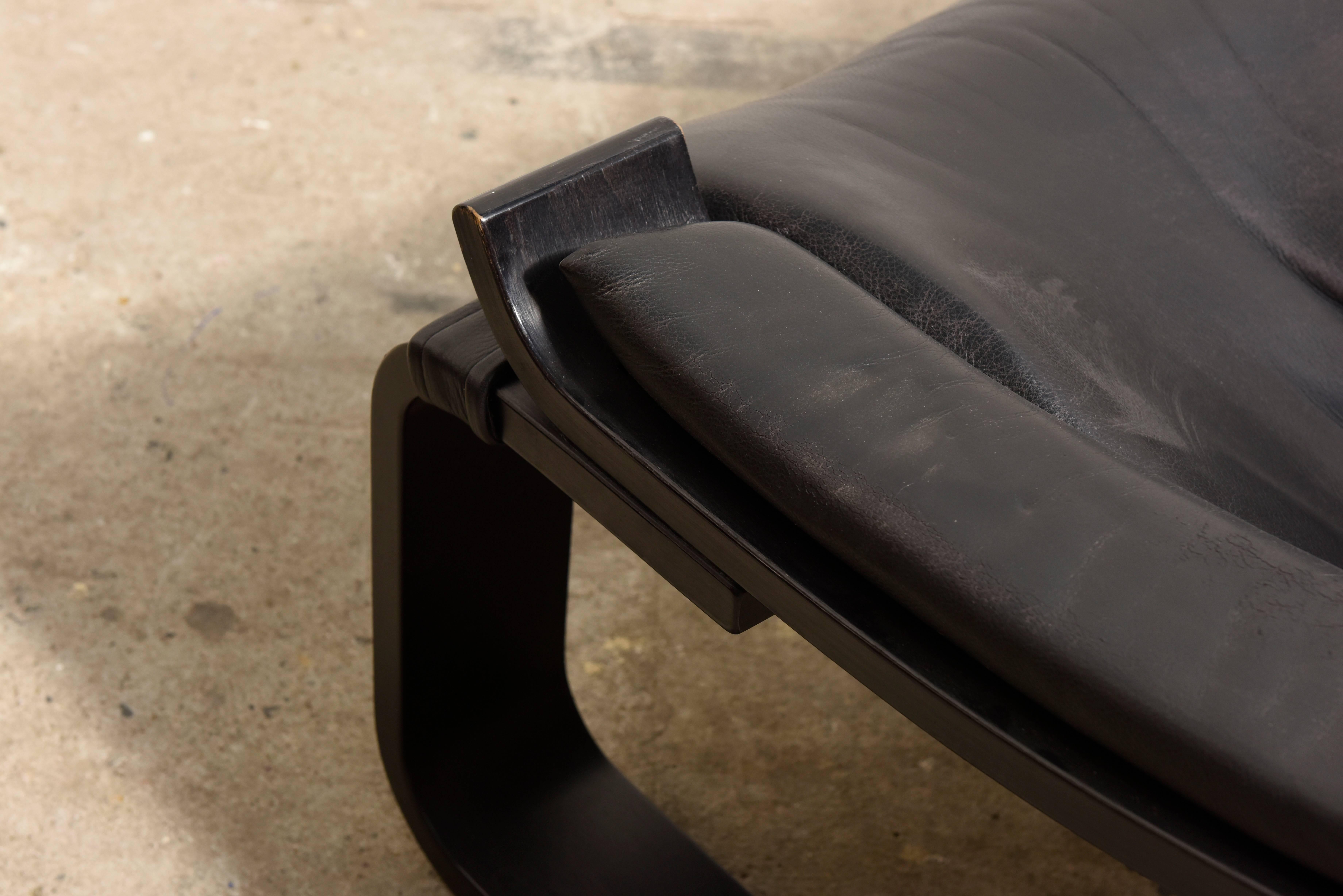 Scandinavian Modern Black Cantilever Lounge Armchair and Footstool by Ake Fribytter for Nelo, Sweden