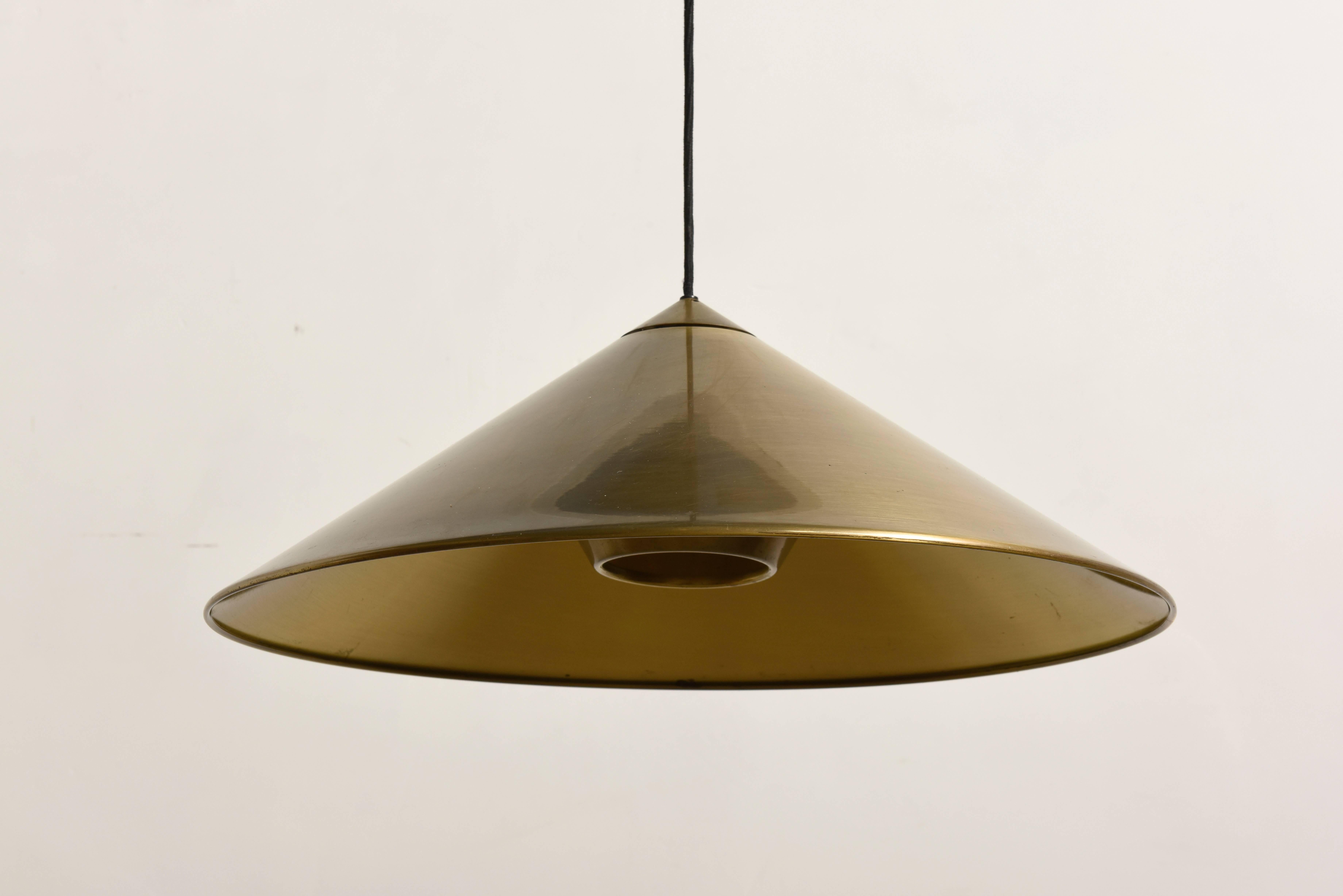 Large elegant adjustable solid counter-balance pendant to easily adjust the light in height,brass brushed shade with diffuser designed by Florian Schulz,Germany.

Beautiful design with diffused light create atmospheric lighting.
Excellent