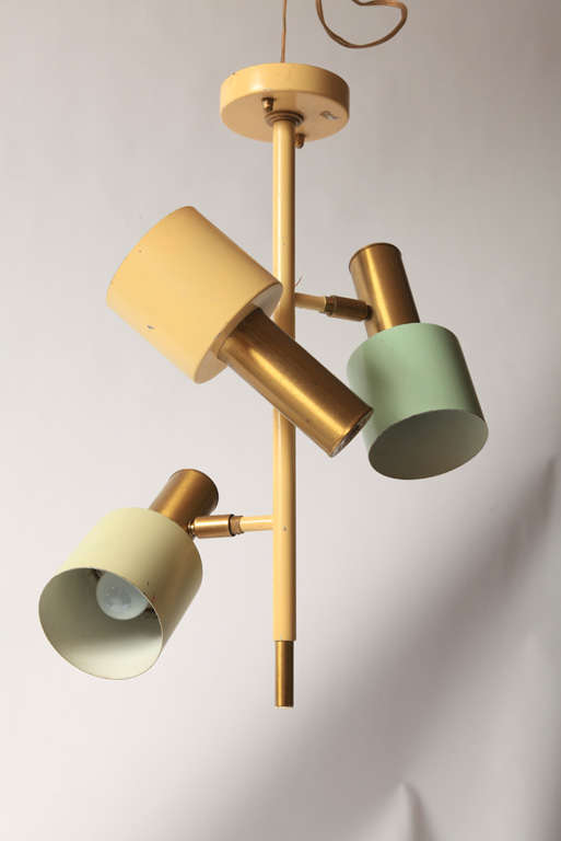 Flush mount lamp by Jo Hammerborg for Fog & Mørup, Denmark,1950s.
Made of brass and colored in mint green and yellow lacquered metal adjustable shades to focus upwards and downwards.

   