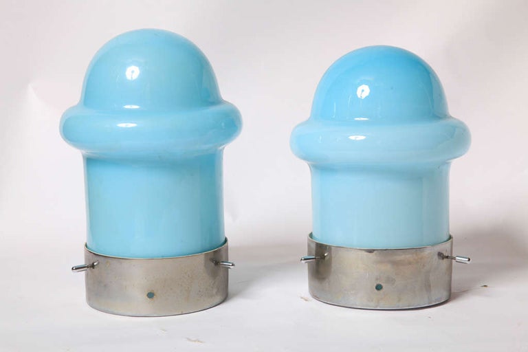 Original sixties flush mount ceiling lamps in a blue opal Murano glass domical shade within a round bracket and a circular chrome plate made of chrome-plated brass designed in 1960s for project building.