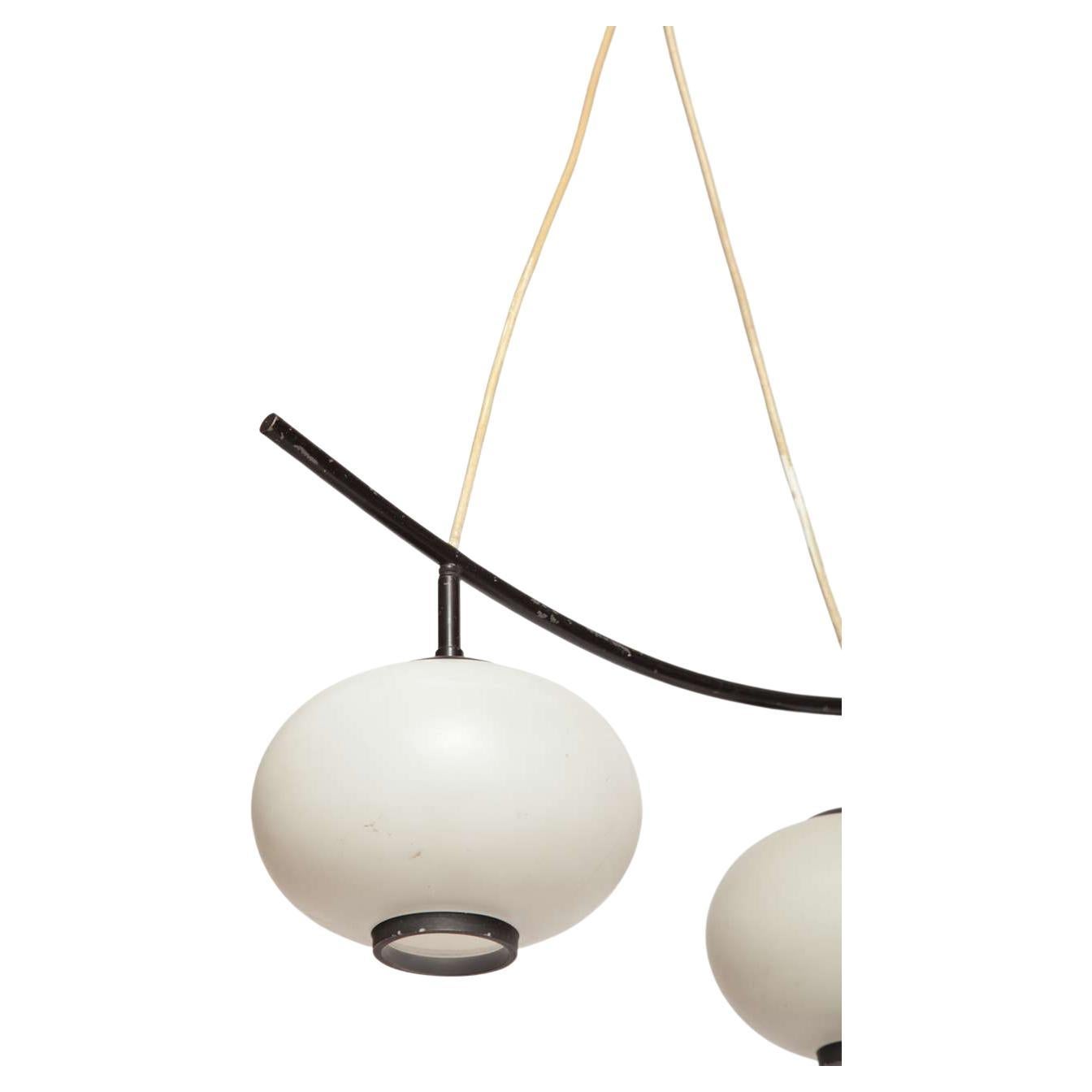 Opaline suspension two globe chandelier attributed to Jean Rispal for Rispal, 1950s. Opaline-glass fifties lamp, designed influenced by the Japonism, frame of metal and black lacquered.The electricity is rewired also for US use.