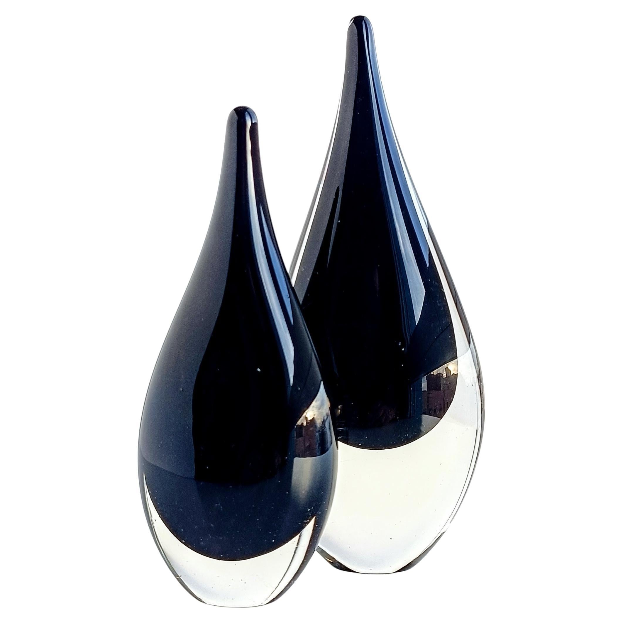 Mid-Century Modern exquisite pair of Murano ¨sommerso¨ glass teardrop sculptures. Crafted with precision and finesse, these sculptures emanate a sense of sophistication and understated luxury, making them perfect for any space with their minimalist