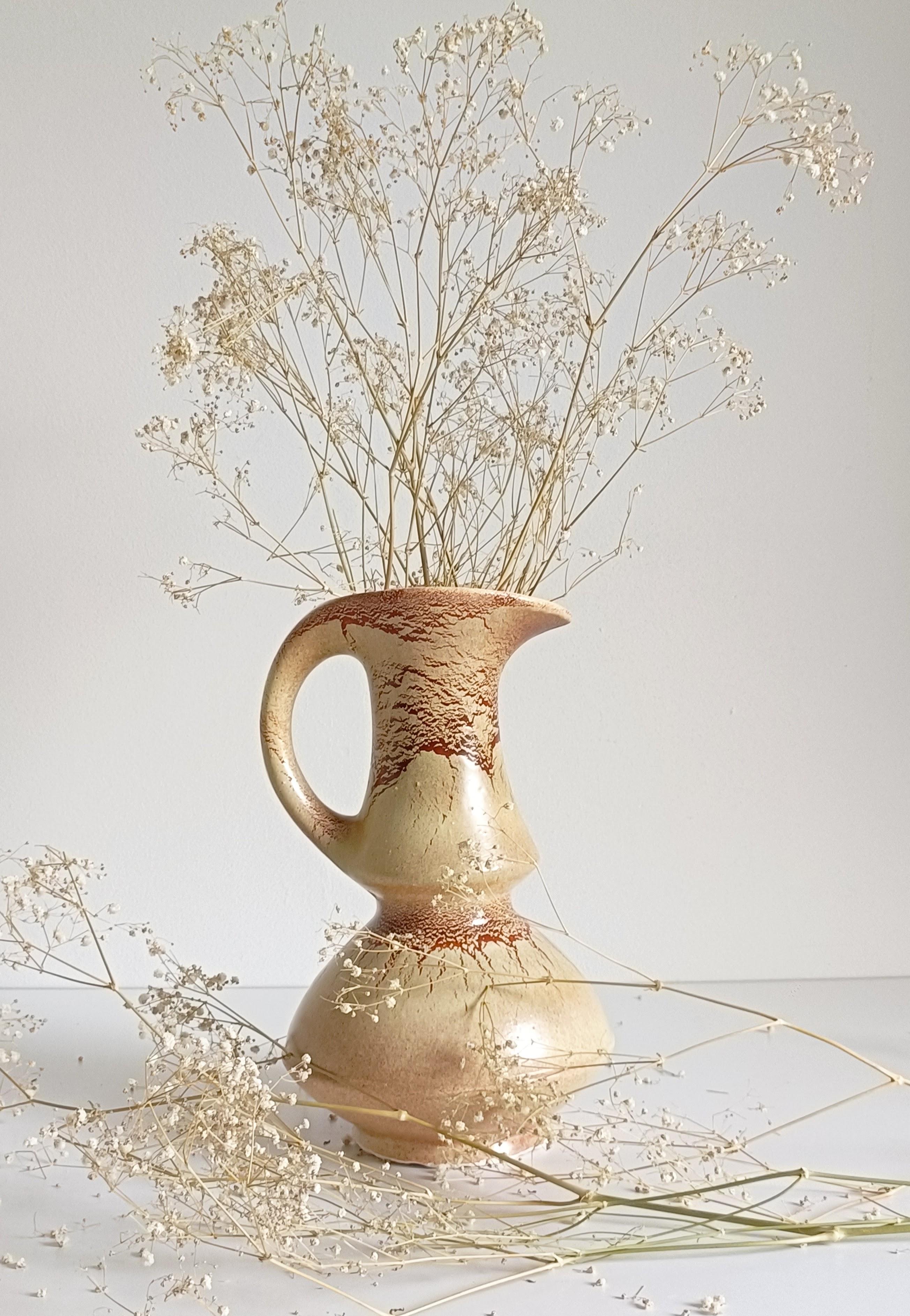 Vaso scultoreo di metà secolo in ceramica di Roberto Rigon per Bertoncello, Italia, anni '60

Un sorprendente e raro vaso scultoreo in ceramica disegnato da Roberto Rigon per Bertoncello Ceramiche, Italia, anni '60 circa. Questo pezzo è firmato con