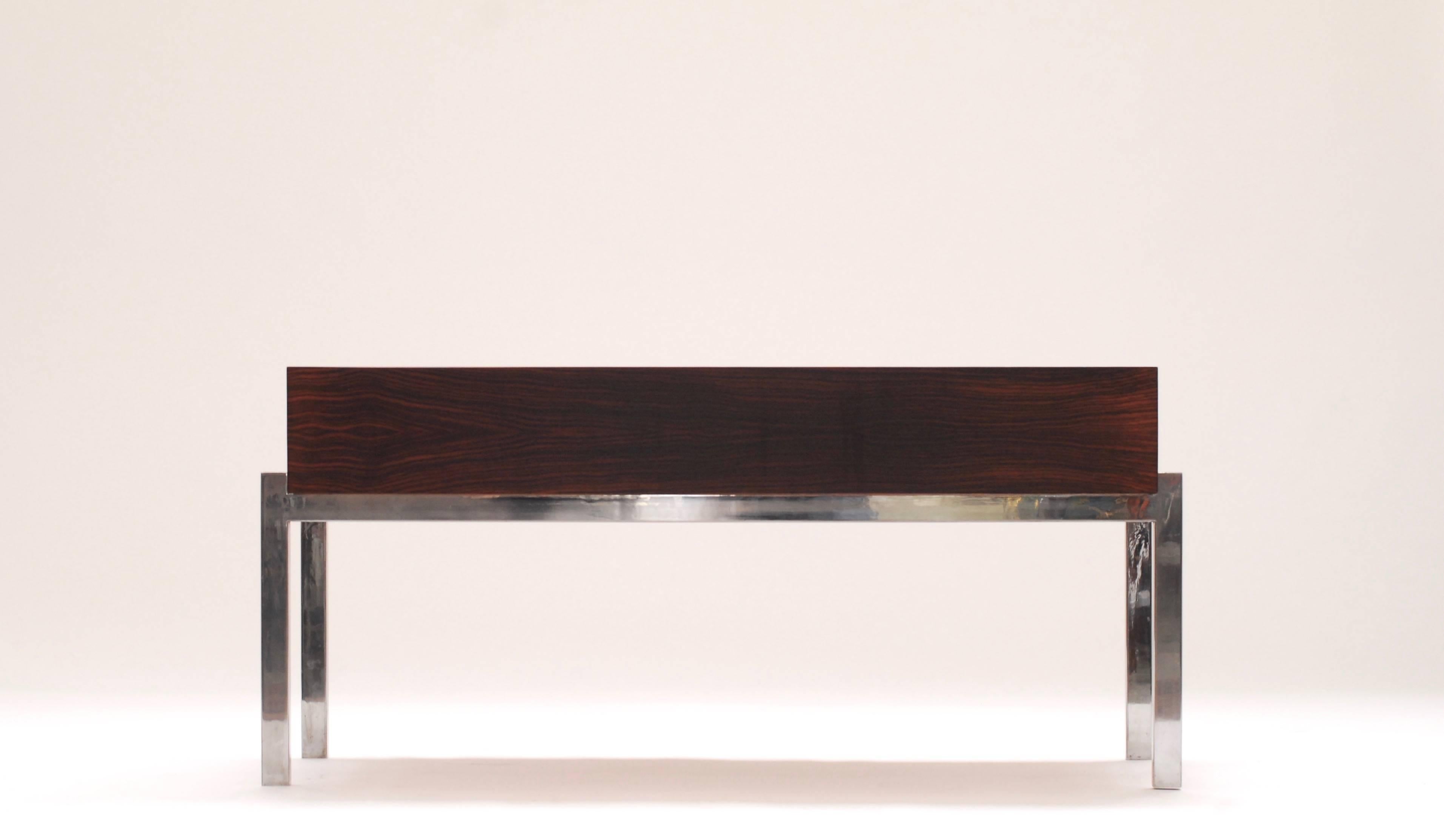 Well proportioned rosewood planter with metal on the inside.
