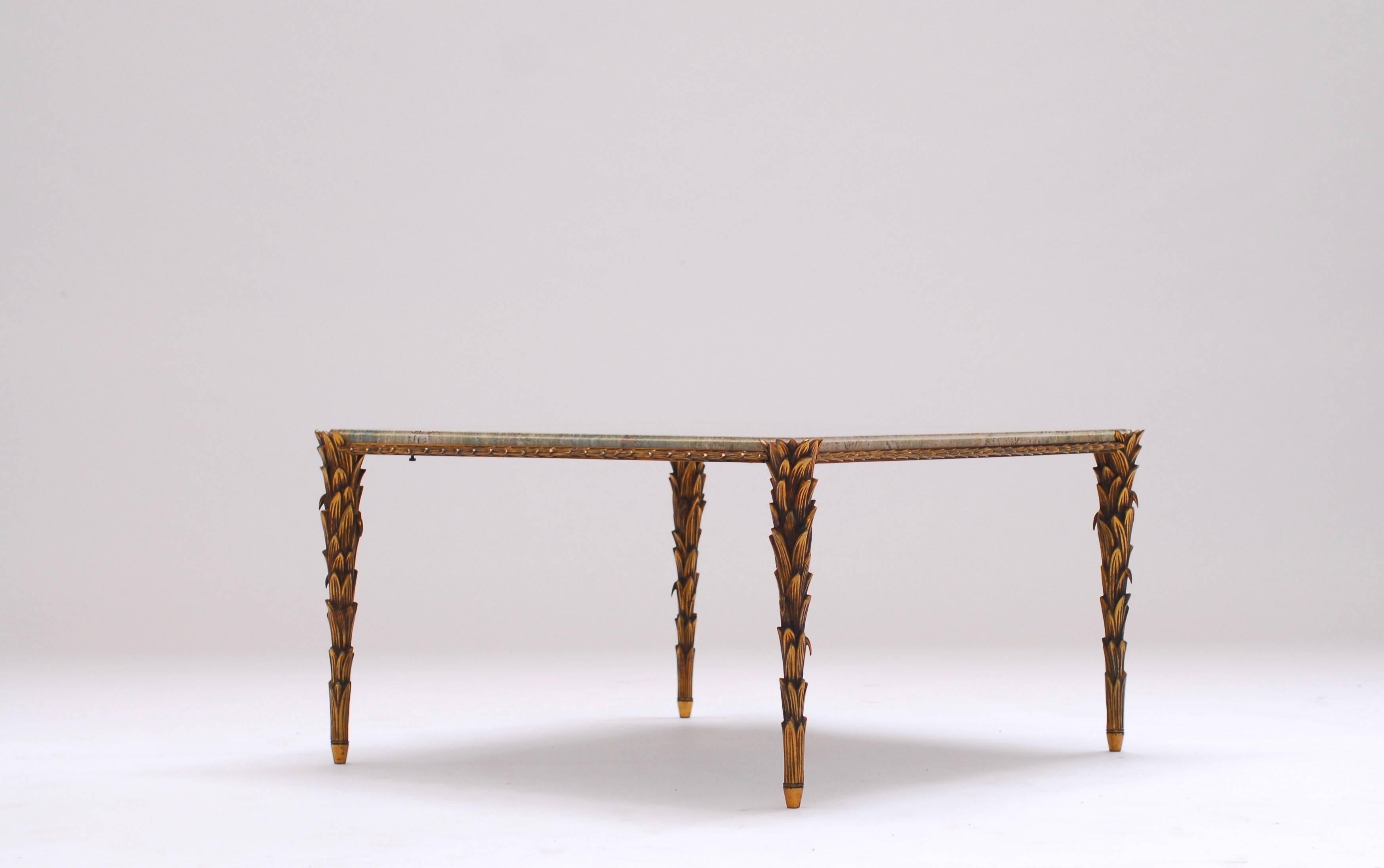 Stunningly executed bronze table by Maison Baguès. The highly articulated legs and the pistachio colored marble top makes it an elegant and yet strong piece.
Beneath the marble top the name of the family who ordered the table is marked handwritten.