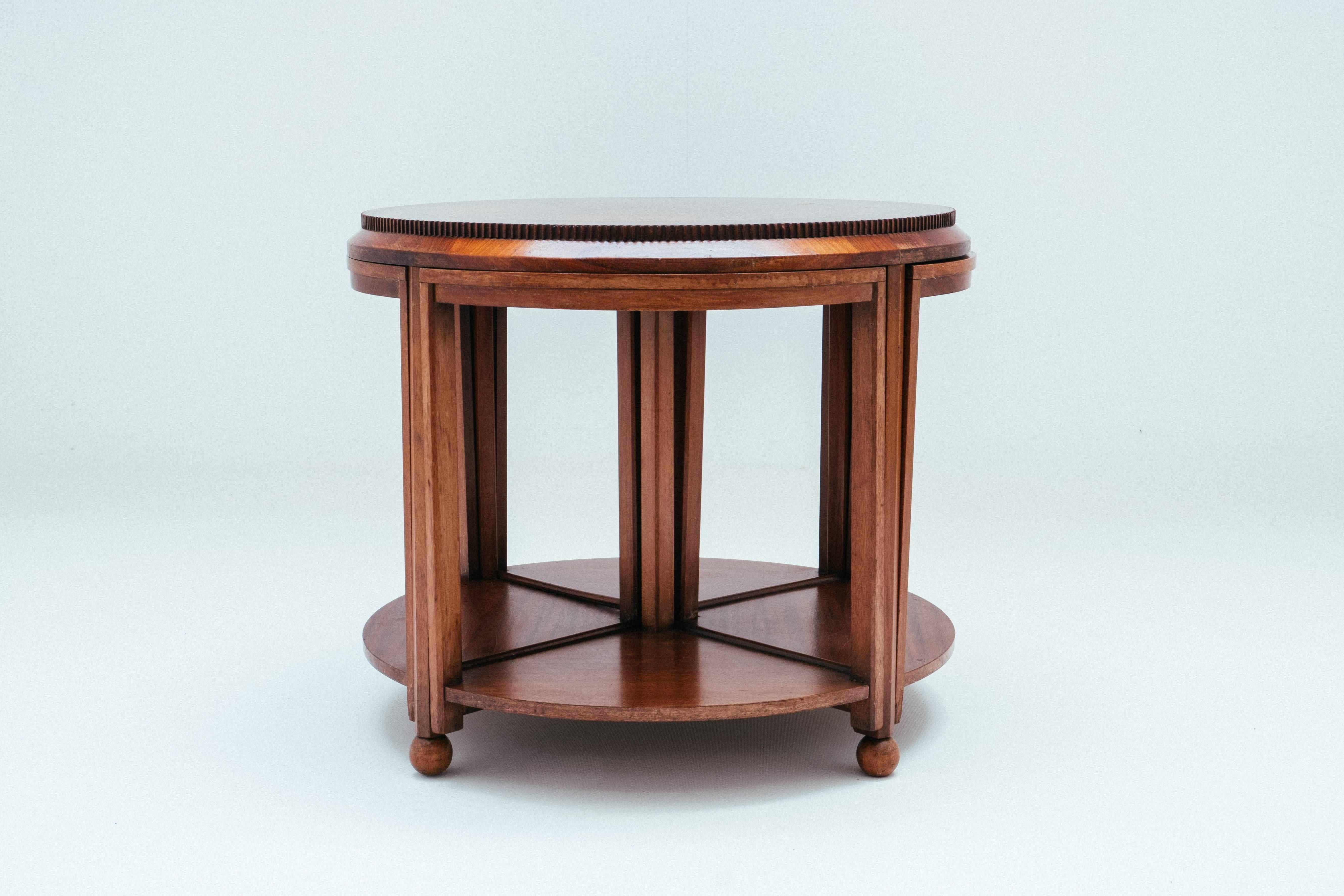 A truly great and unusual production by De Coene in mahogany and walnut. It does not come with a certificate but it has been confirmed by the De Coene specialist Mr Hostens that this is a De Coene design and fabrication.
The technicality and way of