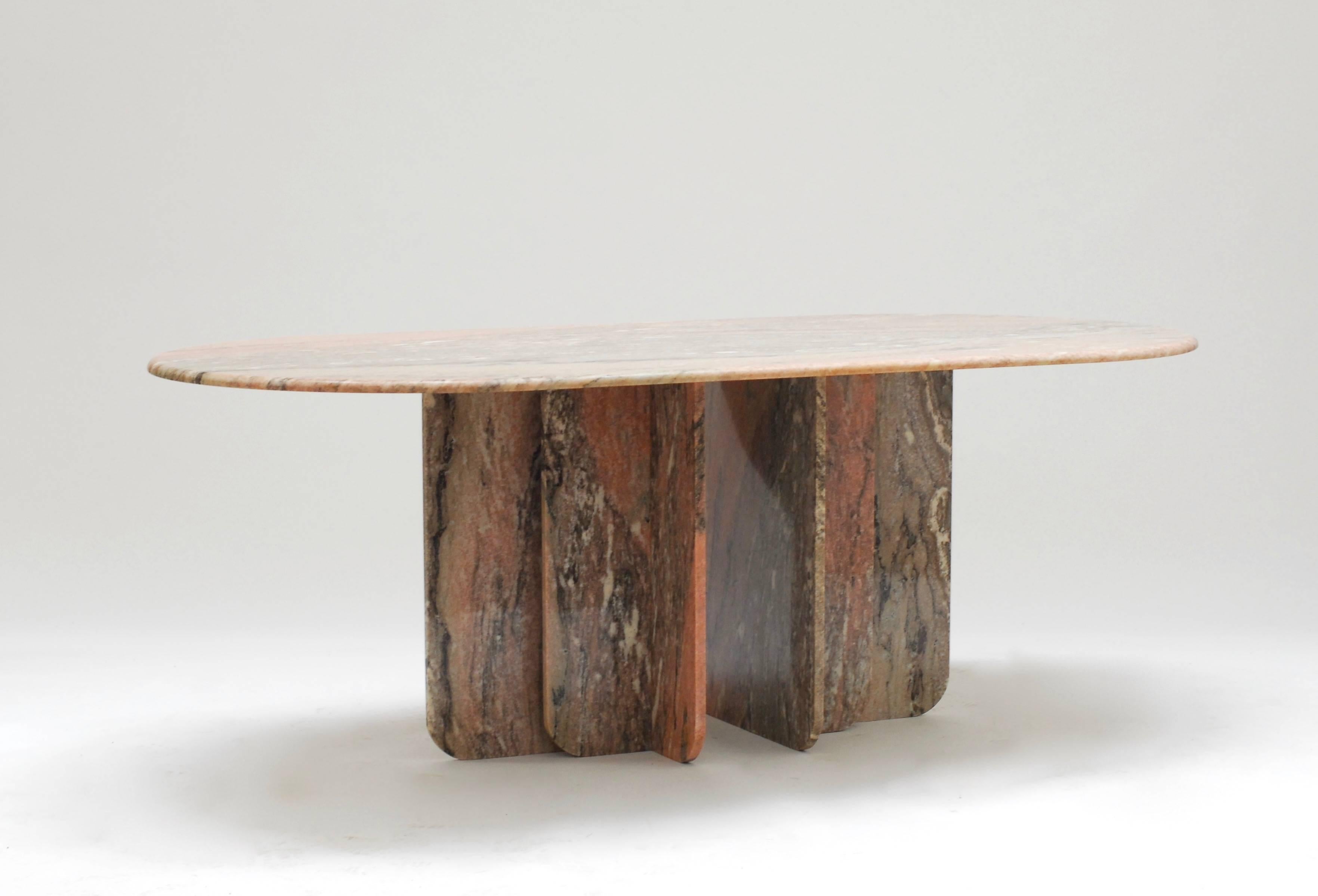 Only two examples of this table were produced from a single block of Brazilian marble. We can find some traces of shiny metal in this marble which makes is quite special.
Well proportioned table in perfect condition.