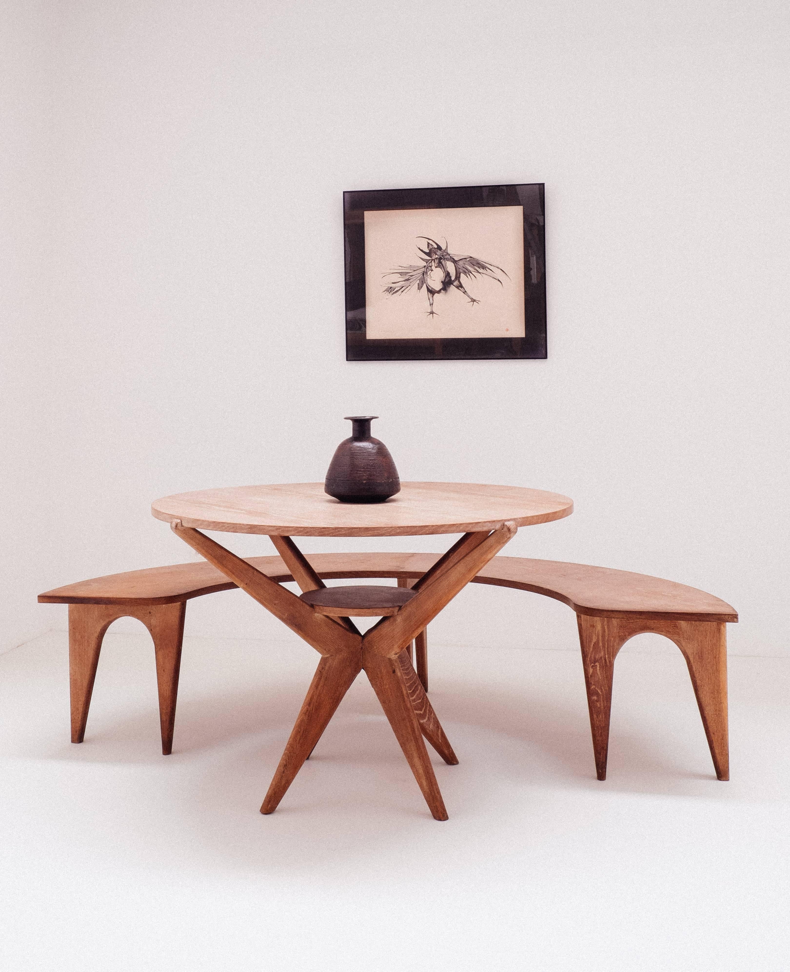 A truly exceptional nice table designed by and architect for his proper family home. Designed and executed as a on off piece in the early 1950s.
It's a veneered table with solid oak legs.