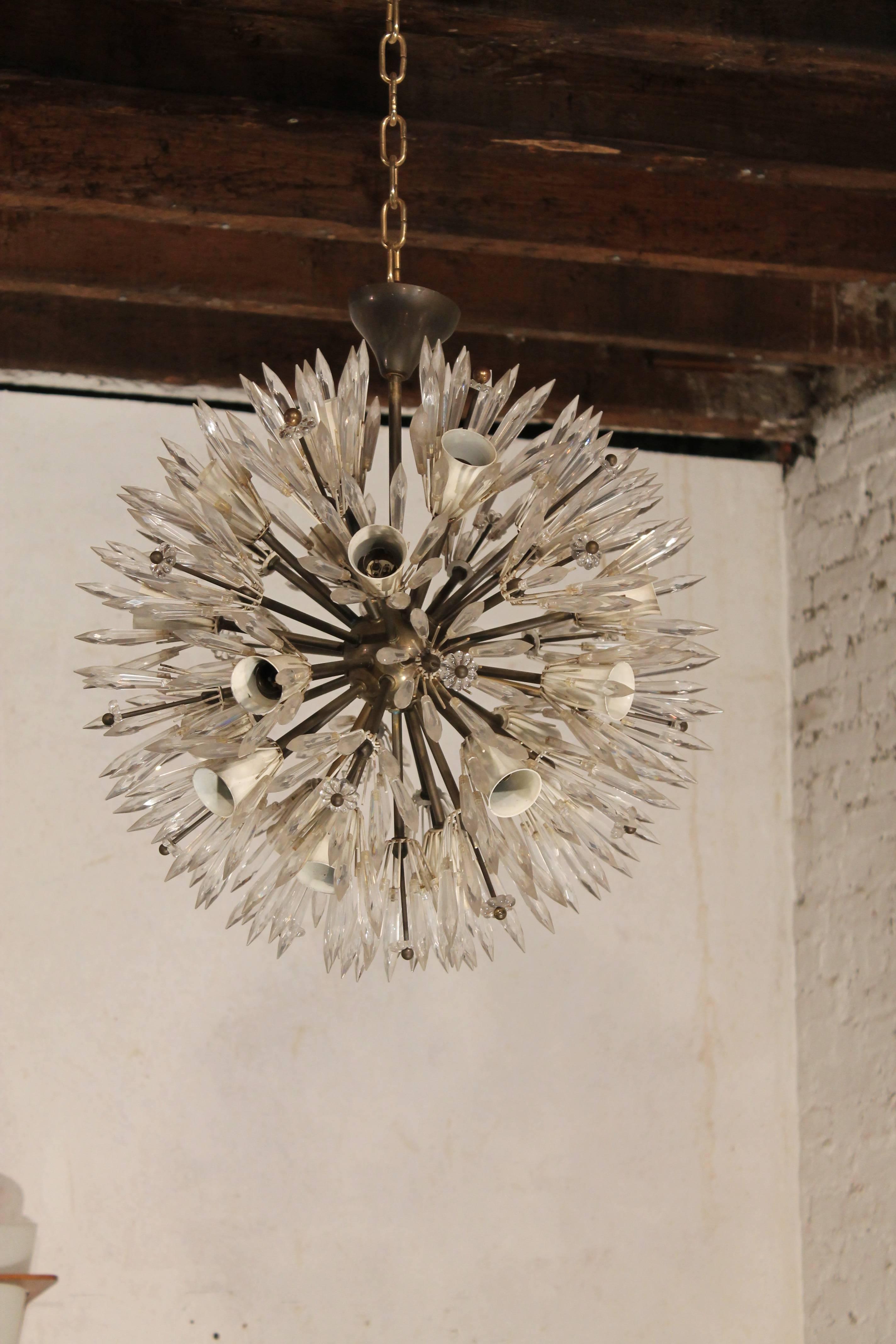 Emil Stejnar snowflake sputnik chandelier, 

Austria, 1960s. 

Good original condition with nice patina.
About twenty-light bulbs,

25 watt.