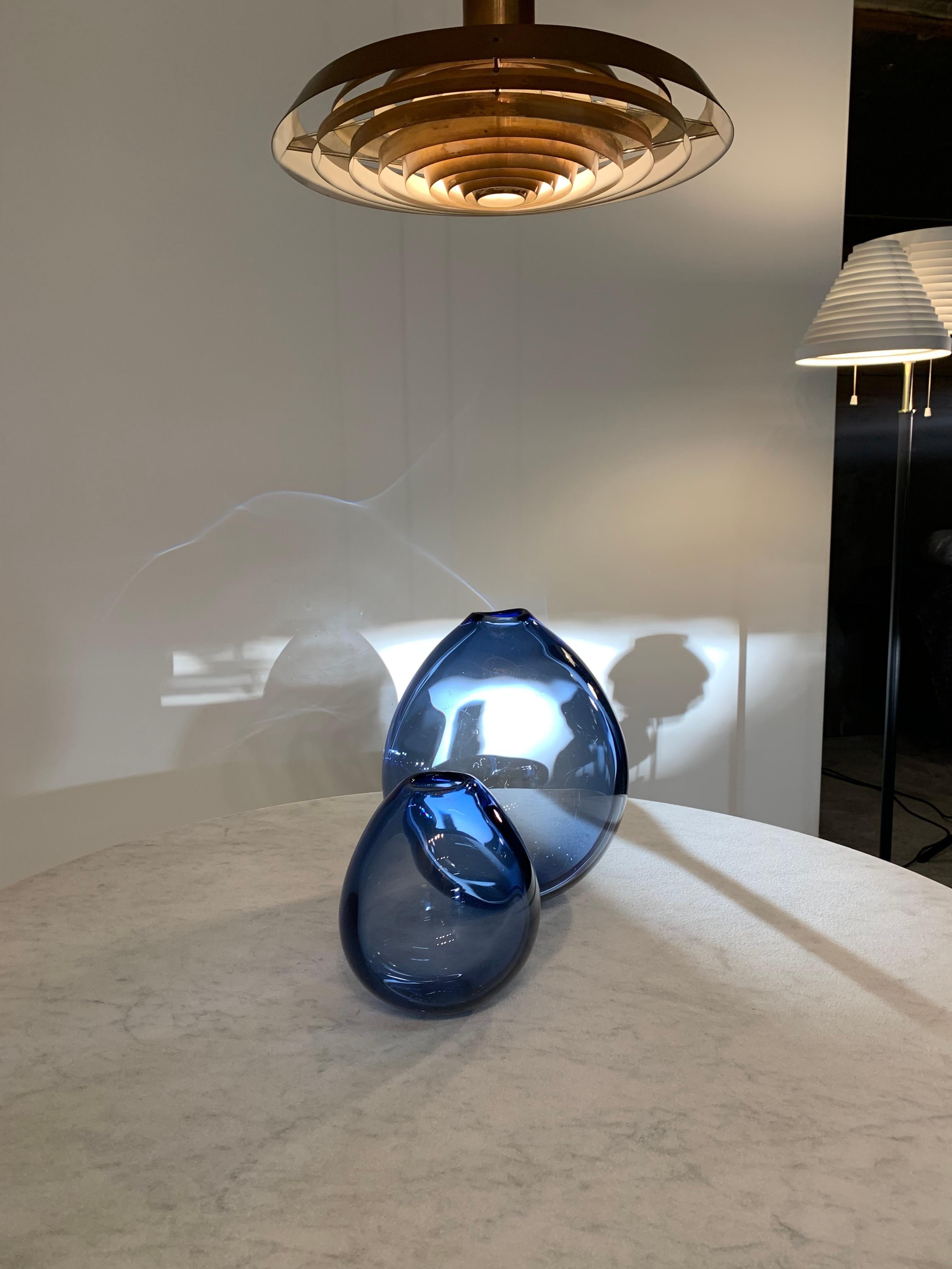 LISTING FOR ASIFA :

Containing 2 pcs of vintage 'Drop' / 'Dråbe vases: 
1 x largest size Sapphire blue 'Dråbe' / Drop vase, 44 cm. Signed. 
1 x second largest Sapphire blue 'Dråbe' / Drop vase, size 25 cm. Signed.  
(shown on first 2