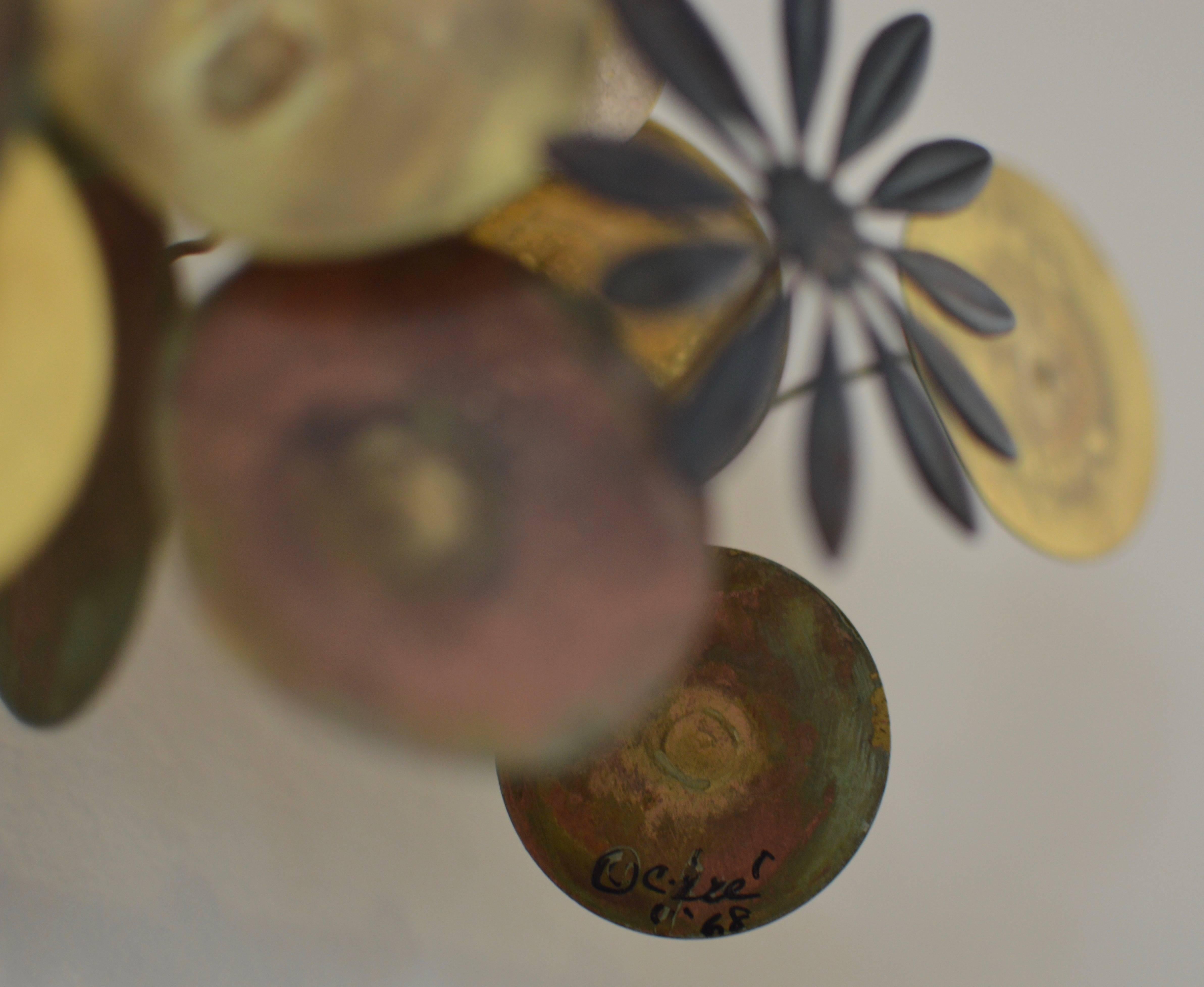Delightful brass & copper oxidation Floral Wall Sculpture with a butterfly and various sizes flowers. Signed, 