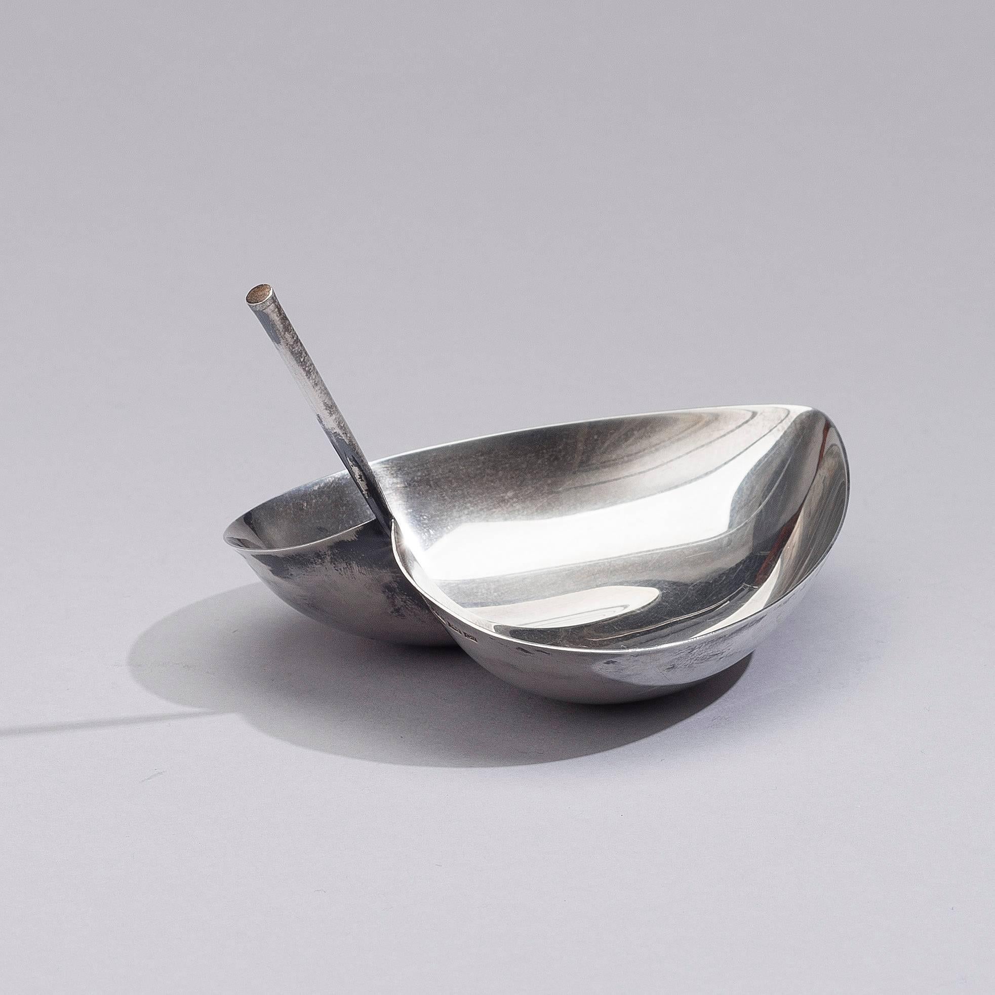 Refined leaf shaped dish from 1956 by Finnish designer Tapio Wirkkala (1915-1985) for Kultakeskus Oy, Finland. 
The dish is fully signed with all required hallmarks, as followed: TW (designer initials), company brand, Finnish crown mark, fineness