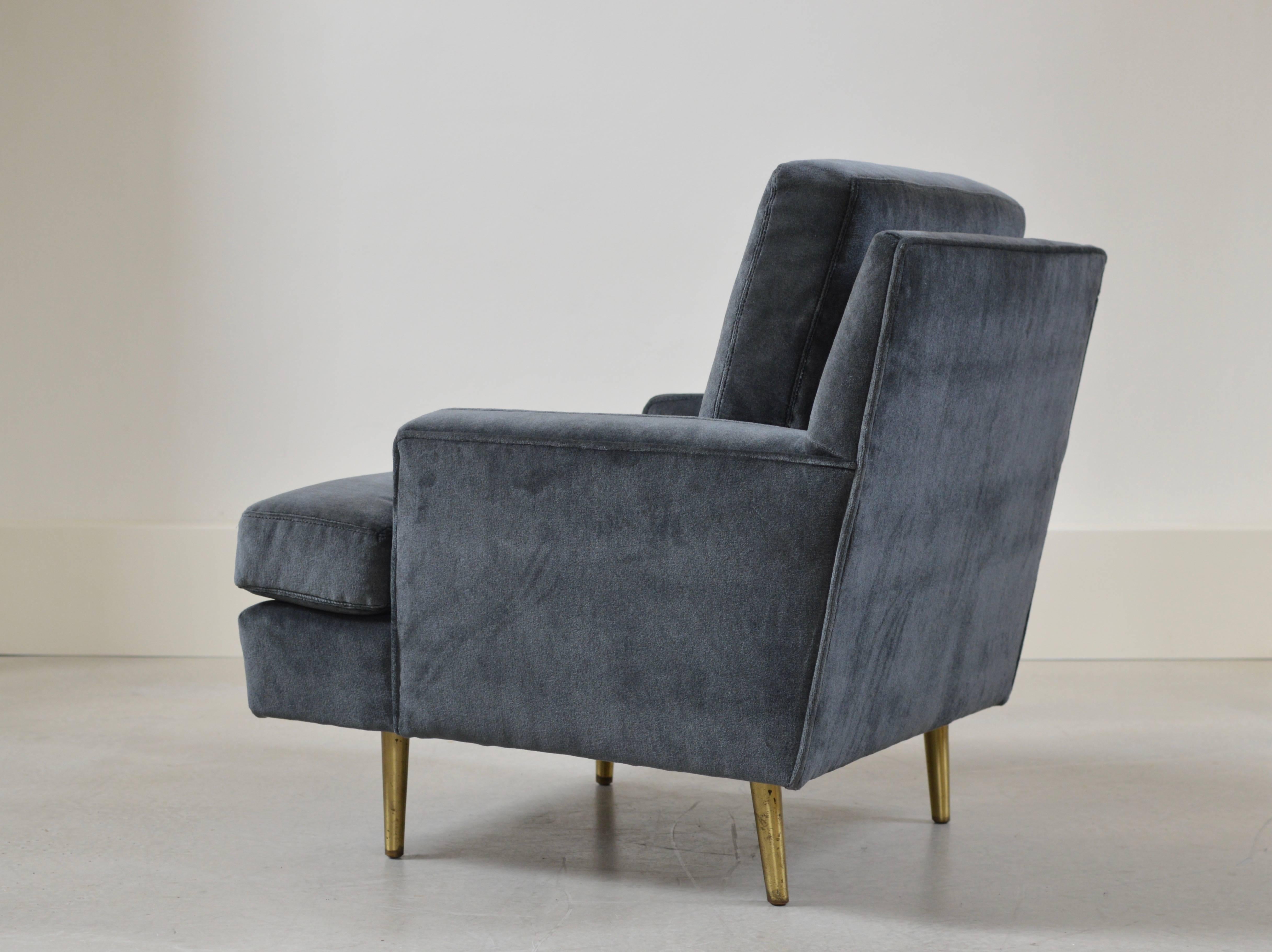 Early 1950s armchair model 4907-1 by Edward Wormley for Dunbar with brass legs. Armchair is fully restored and re-upholstered the a wonderful rich mohair fabric and comes with the original early Dunbar label to underside. 

A wonderful
