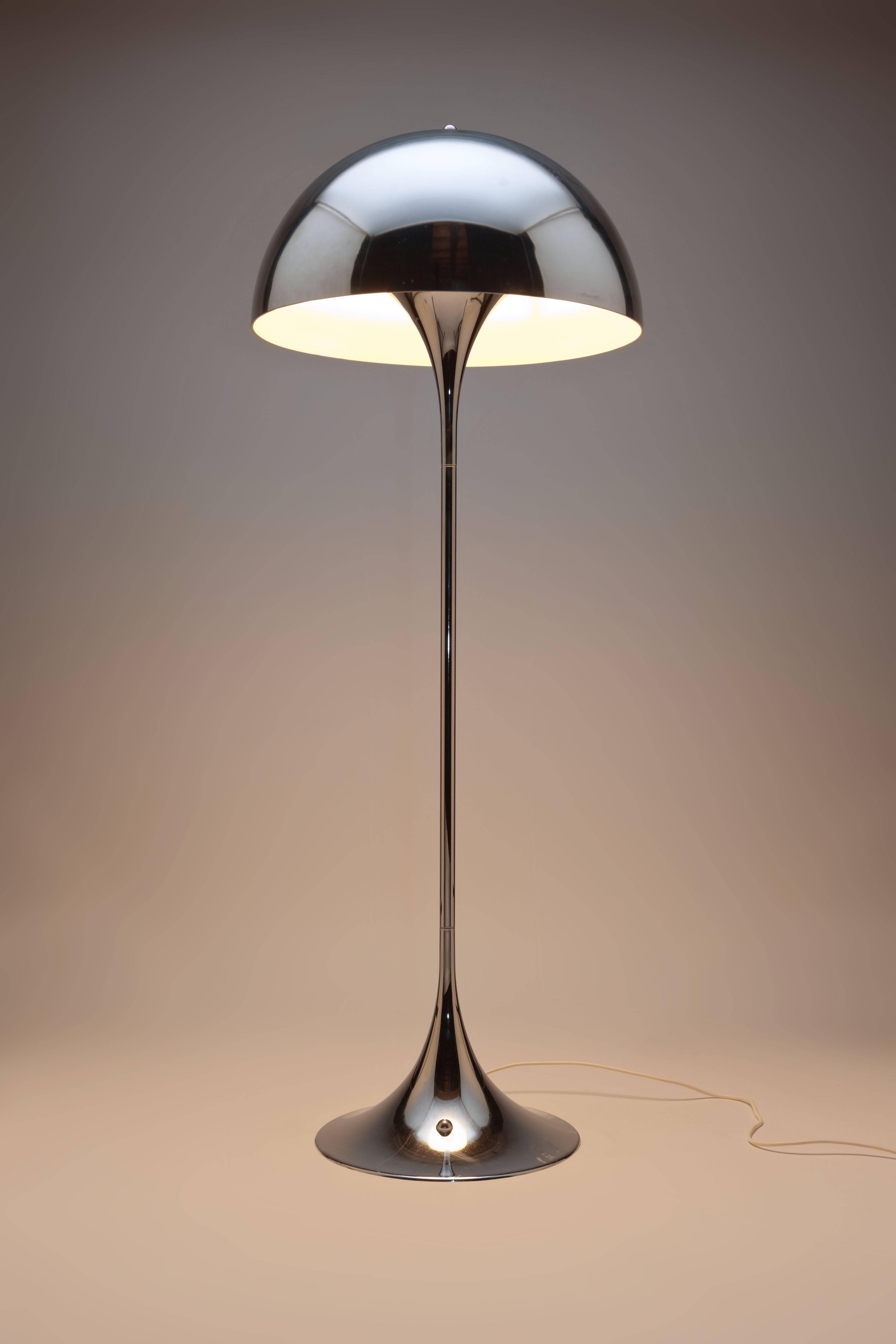 Very rare all chrome version of the iconic Panthella floor lamp, designed in 1971 by Danish designer Verner Panton and produced by Louis Poulsen.
Panthella is characterized by its harmonious, calm form. The semi-circular shade creates a soft,