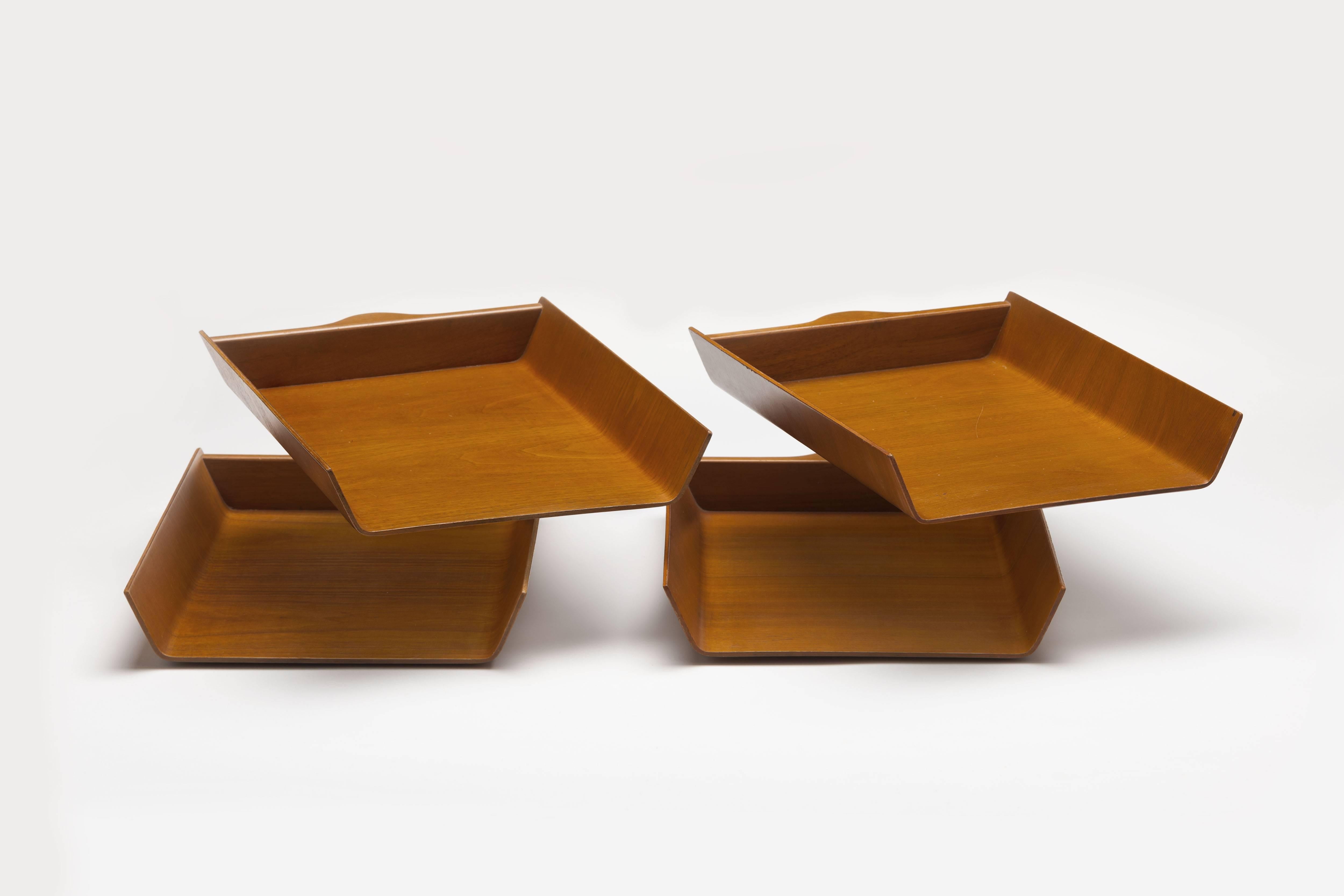 Pair of early 1950s teak plywood molded letter desk tray's by Florence Knoll.
Each individual tray comes with an original early 1950s Knoll label (see last photo).
These tray's have been exceptionally well preserved since they have been stored for