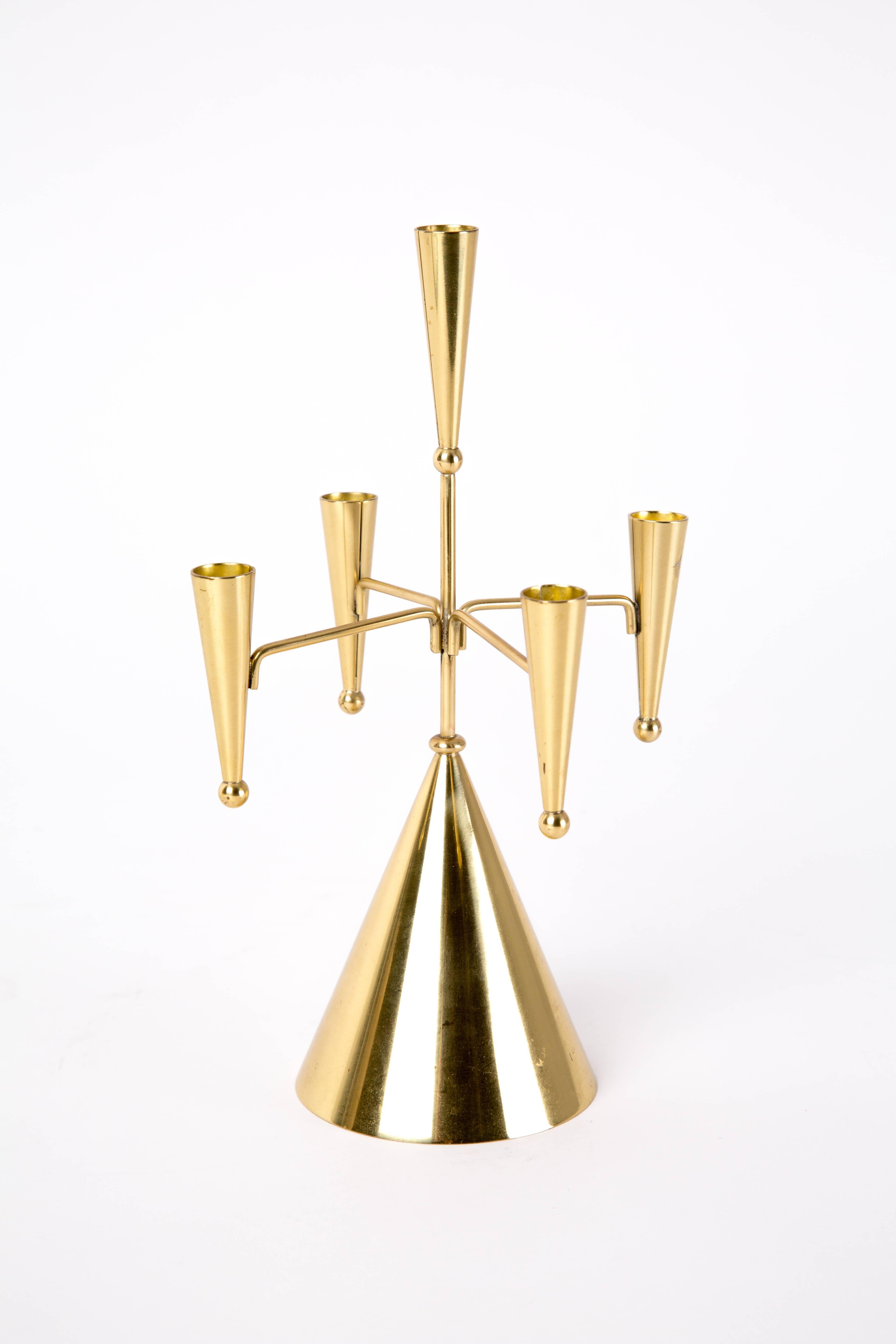 Brass candelabrum . Brass candelabrum of Ystad metall. The base is 9 cm and the height is 23 cm.