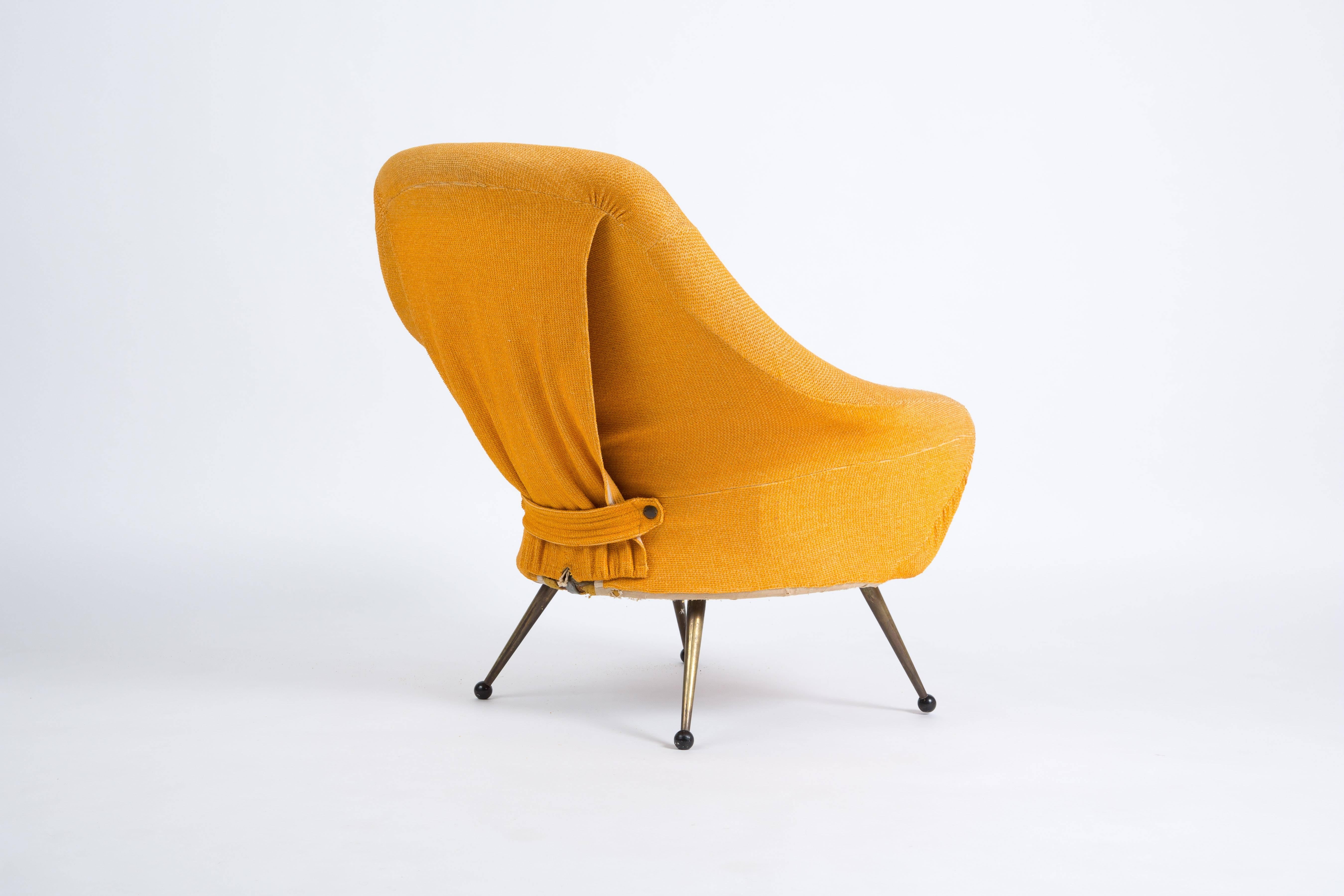 The Martingala designed by Marco Zanuso in 1954. Latex foam upholstered seat shell with removable covers on tapering brass legs terminating on ball feet.

The chair is in normal condition, but need to be reupholstered. So you can choose your own