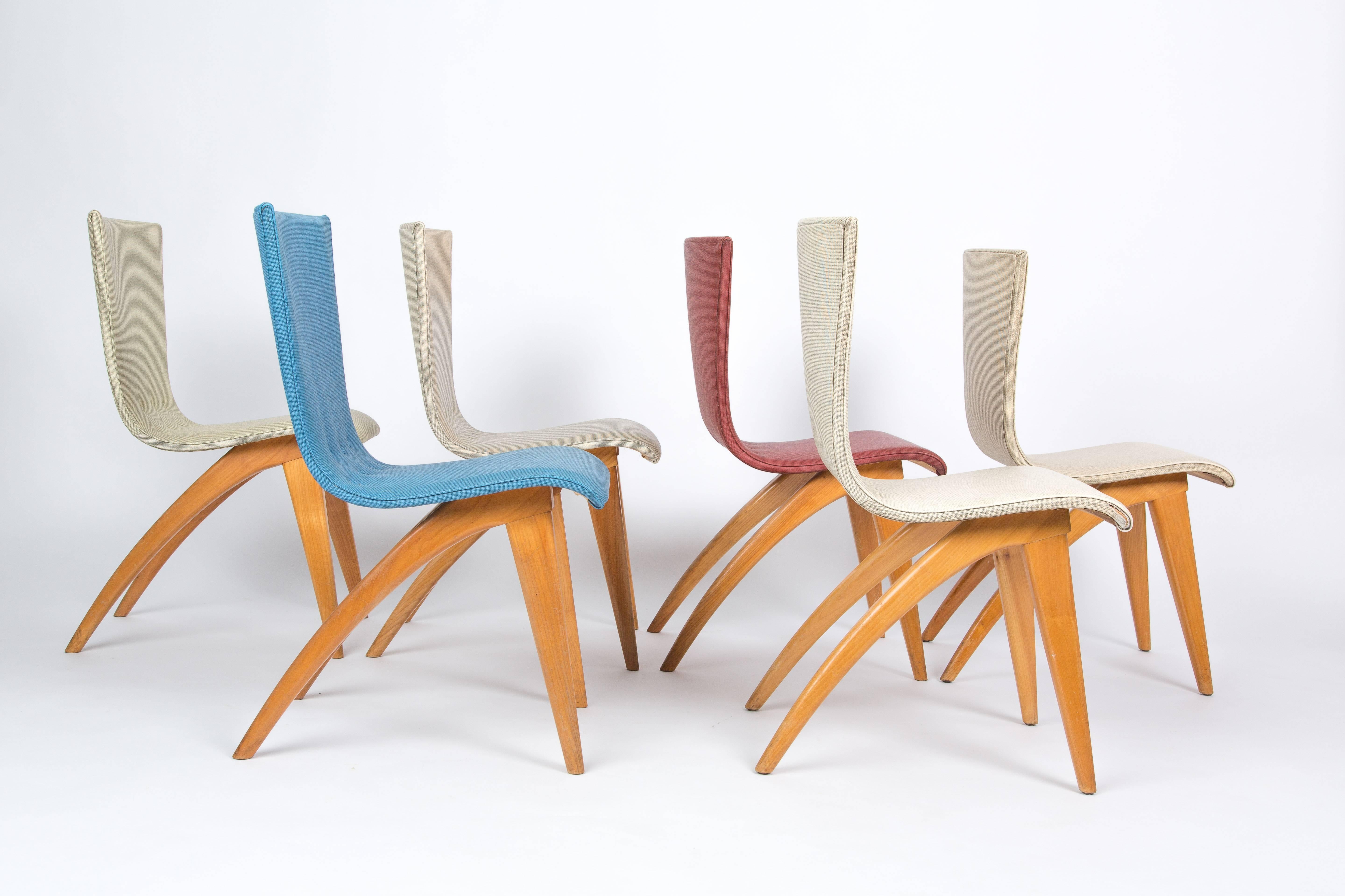 A set of six colorful Van Os chairs. The chairs have its characteristic bend form. The sitting has its original fabric. 