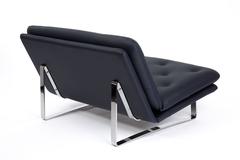 ARTIFORT LEATHER SOFA.  dark blue designed by Kho Liang Ie Chrome-plated frame