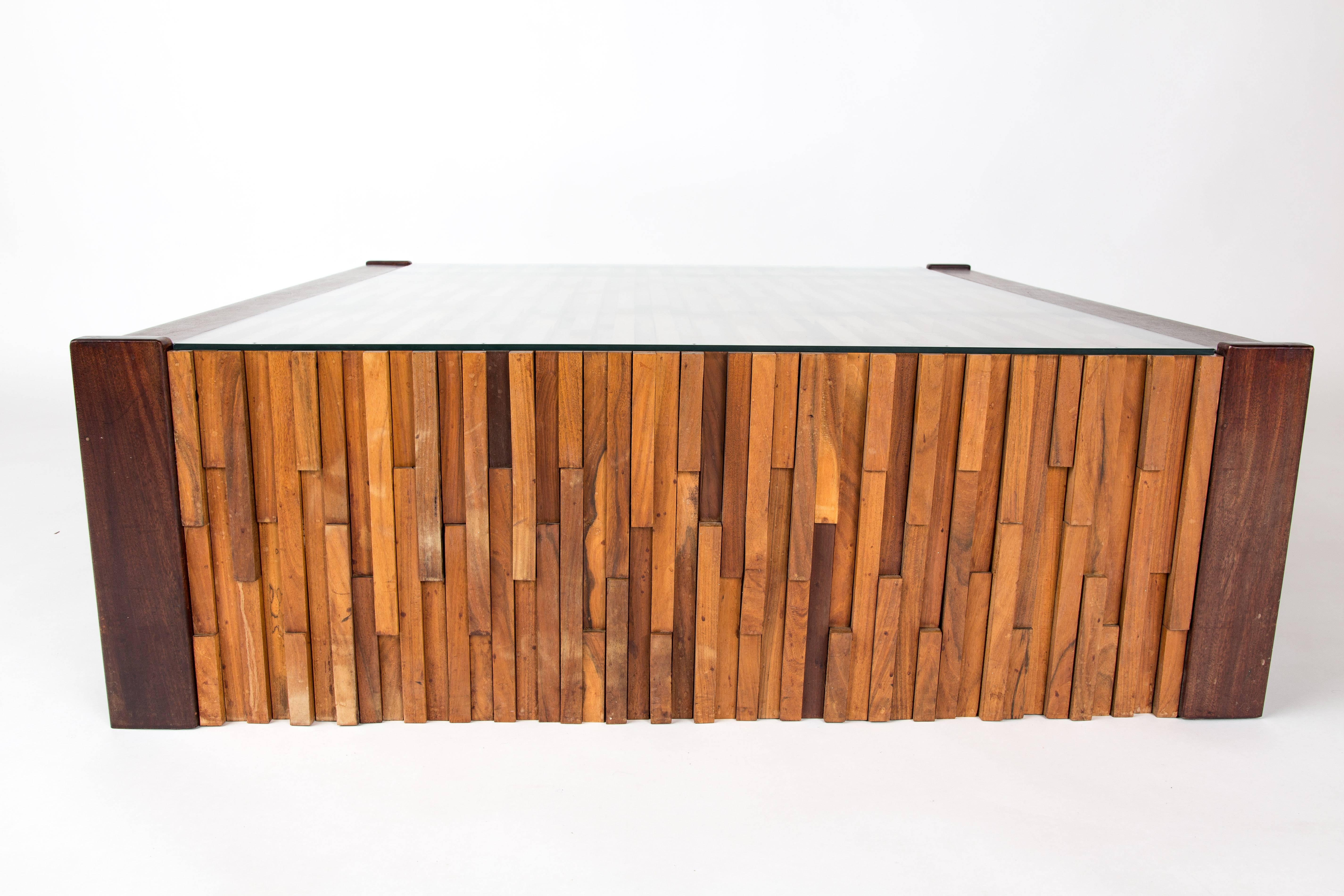 PERCIFAL LAFER . Brutalistic large coffee table designed by Percival Lafer in Brazil, circa 1960.

The table is made of different tropical hard wood, for example Jacaranda. The different layers of small wood pieces are put together to an arty