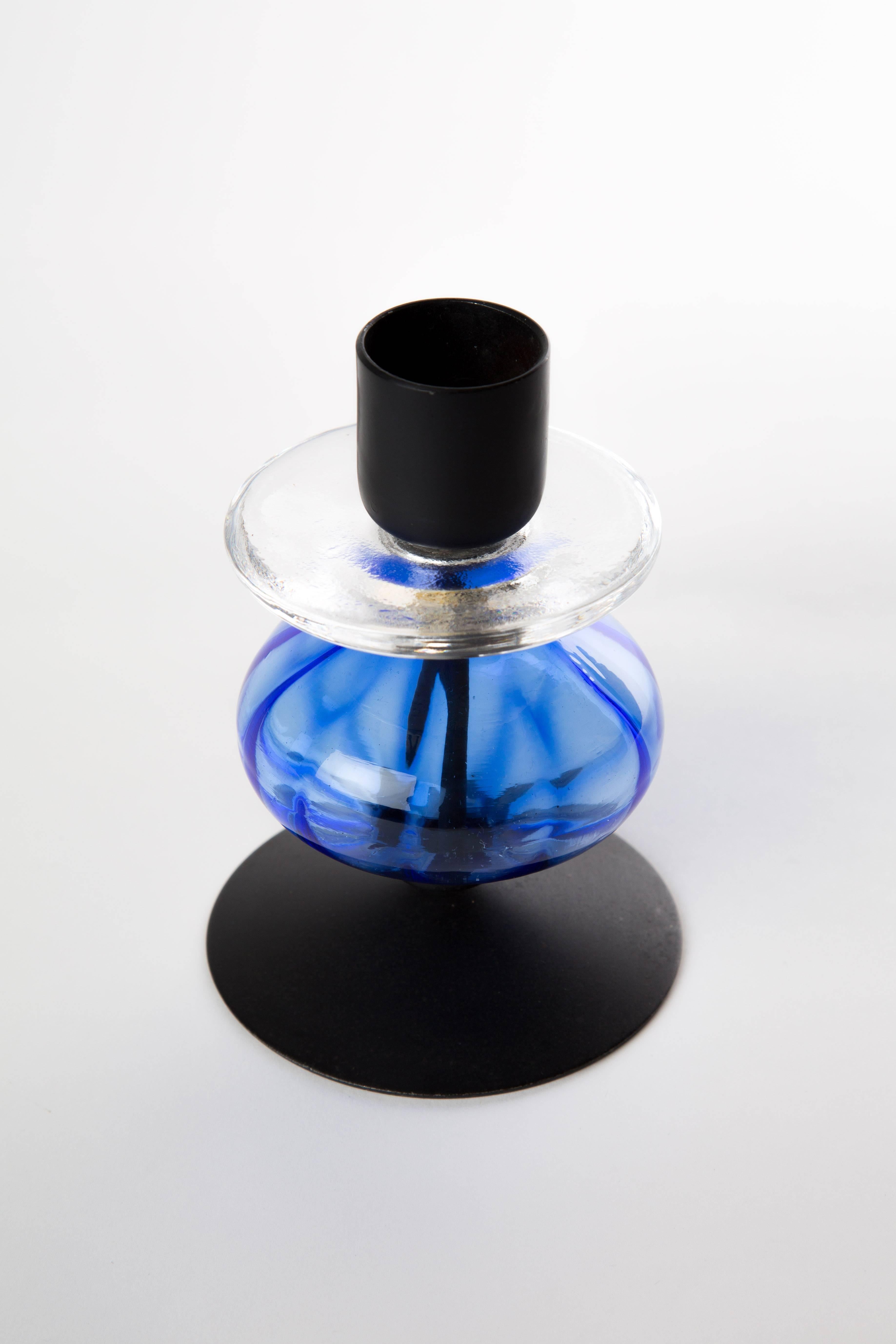 ERIK HOGLUND CANDLEHOLDER with blue transparent artglass. The combination with the black metal is characteristic for Erik Hoglund. Marked with a sticker 