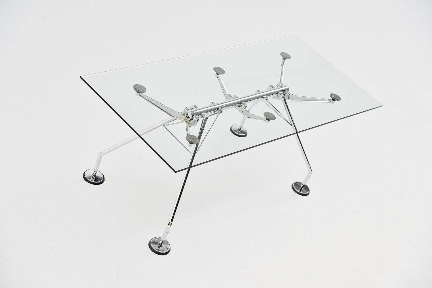 Instant Classic is this table designed by Sir Norman Foster for Tecno, Italy, 1987. This table is from the Nomos series which Foster designed for his own office in London. But this table became a worldwide success. This table looks amazing with high