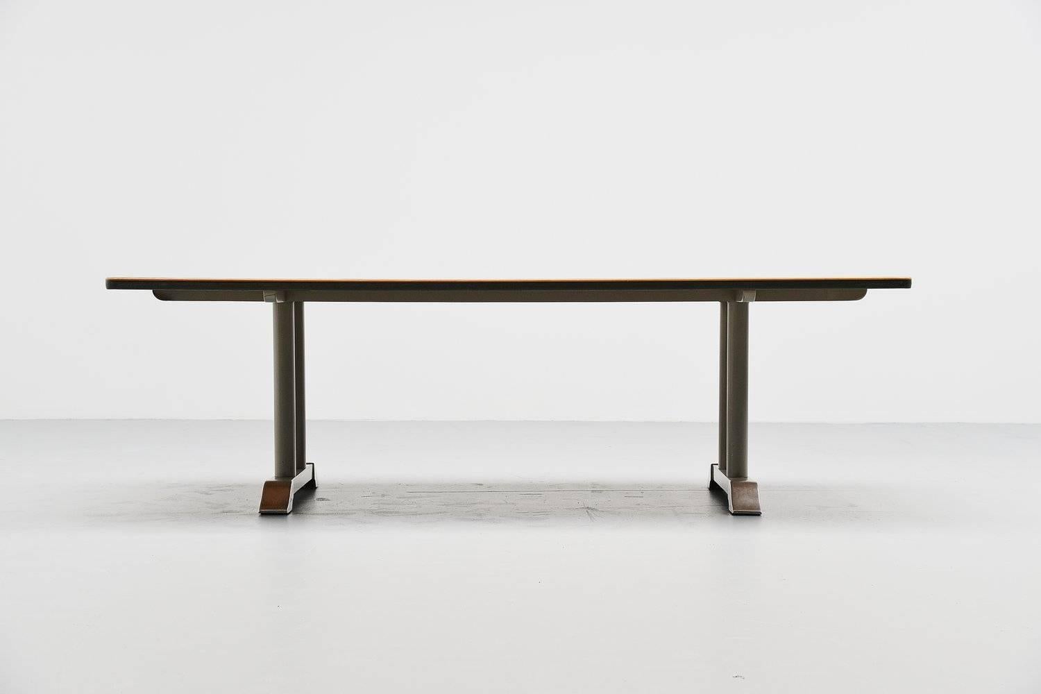 Large conference or dining table designed by Chris Hoffmann for Gispen, Holland 1949. The table has a light grey lacquered frame with aluminum feet (In Holland this is called a toe table) and it has a long dark grey vinyl top with plastic and metal