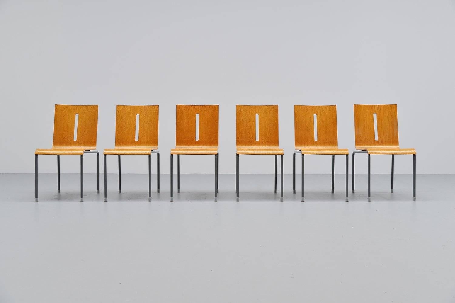 Very nice set of six Hopper chairs designed by one of the most important Dutch designers of the 21st century, Richard Hutten. These chairs were made in his own atelier in very small production numbers. The chairs have a grey lacquered tubular metal