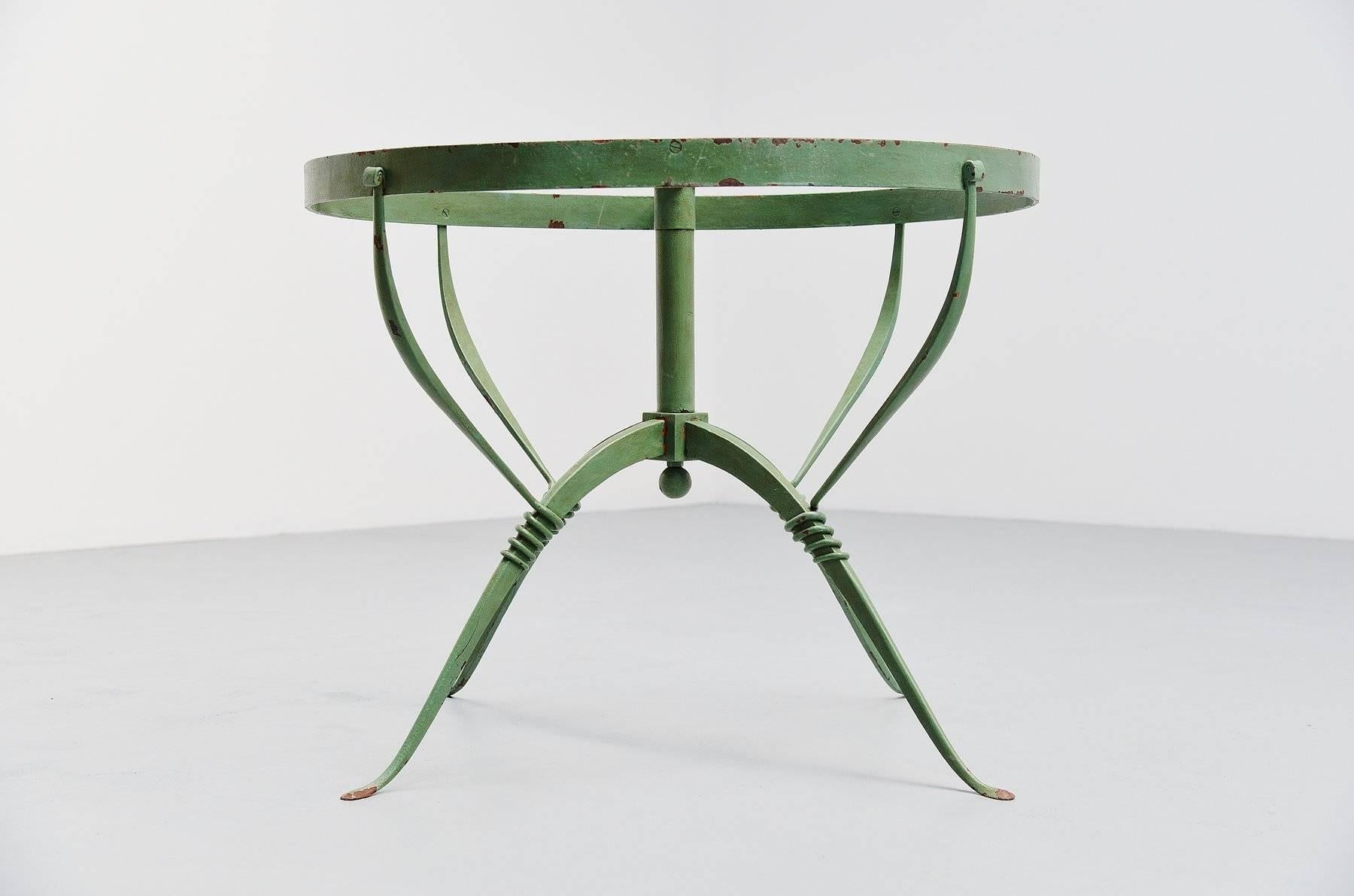 Very nice and exceptional veranda table base designed by Raymond Subes for Maison Dominique, France, 1930. This table base is made of mint green painted wrought iron and is fantastic shaped. This is for the table base only so you can have a top made