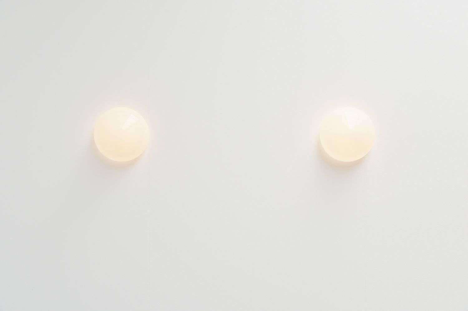Very nice wall or ceiling lamps designed by Wilhelm Wagenfeld for Lindner, Germany, 1955. These lams have a very nice organic mushroom shape. The ceiling plate is made of solid porcelain and the shade is made of white glass. The lamps give very nice