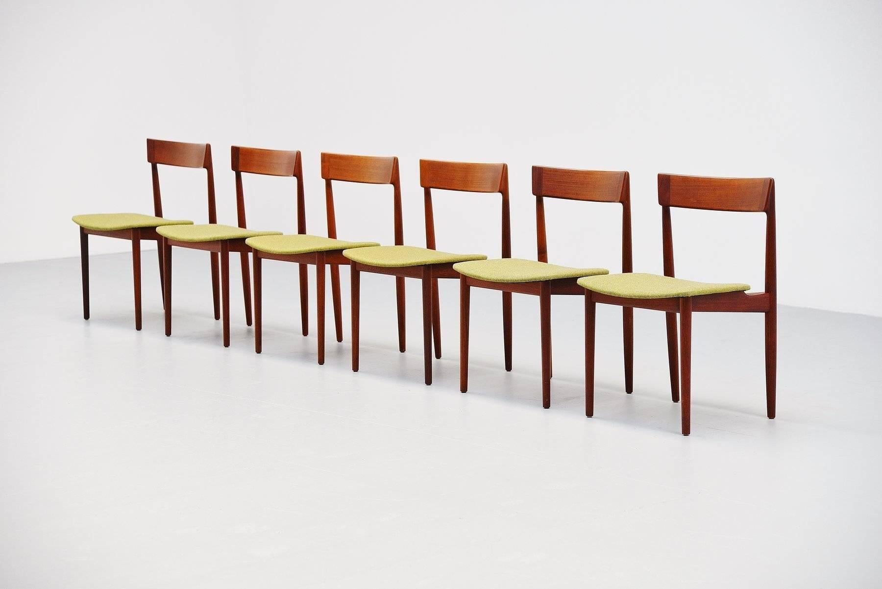 Nice set of six dining chairs designed by Henry Rosengren Hansen for Brande Møbelindustri, Denmark, 1960. These chairs are made of solid teak and have new upholstered seats in forest green. The chairs are very well crafted and all marked with the