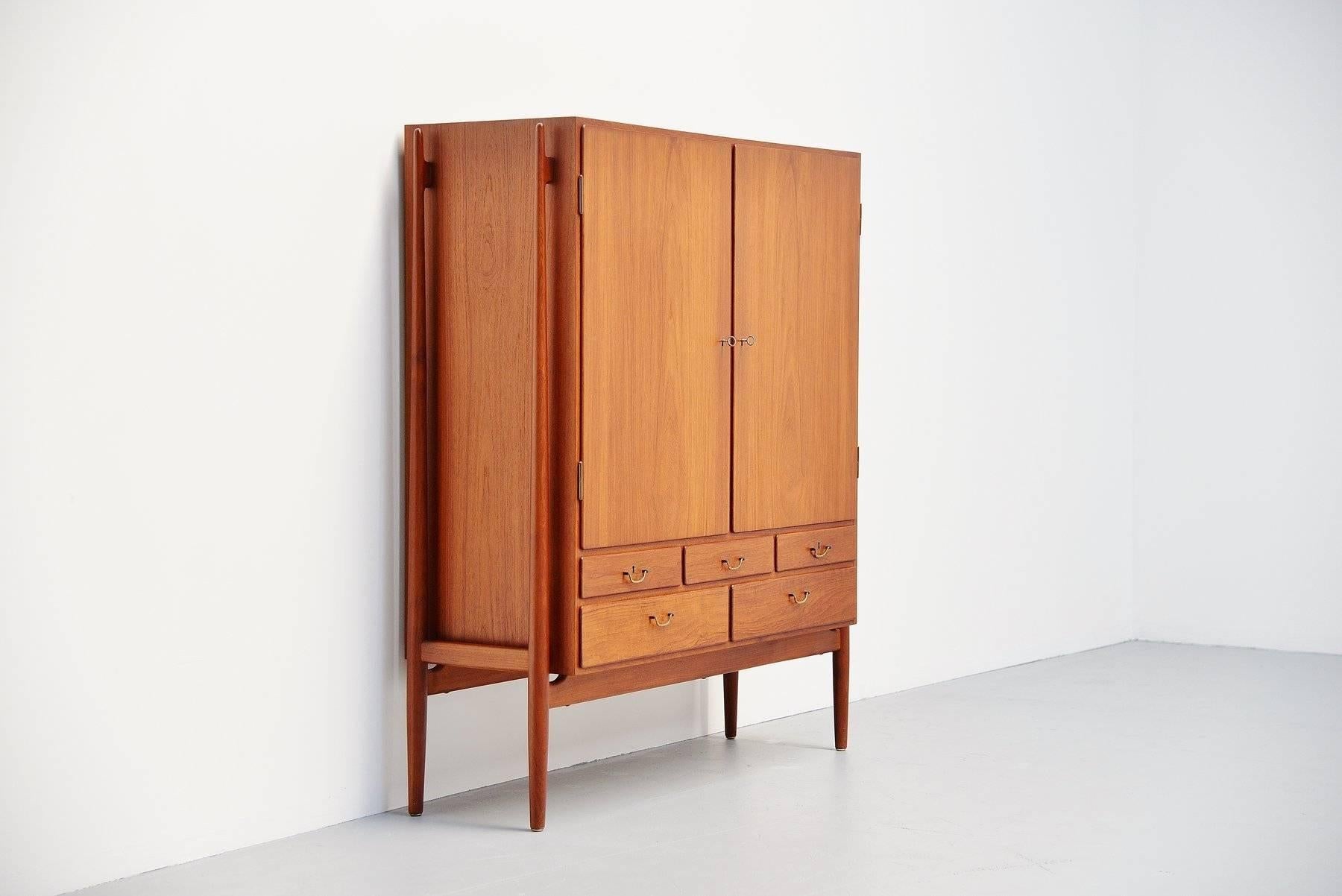 Super rare high buffet designed and made by cabinetmaker Niels Vodder, Denmark, 1956. Niels Vodder was the cabinetmaker of Finn Juhl and for sure that's where he learned to make furniture. The influences from Finn Juhl in this buffet are very