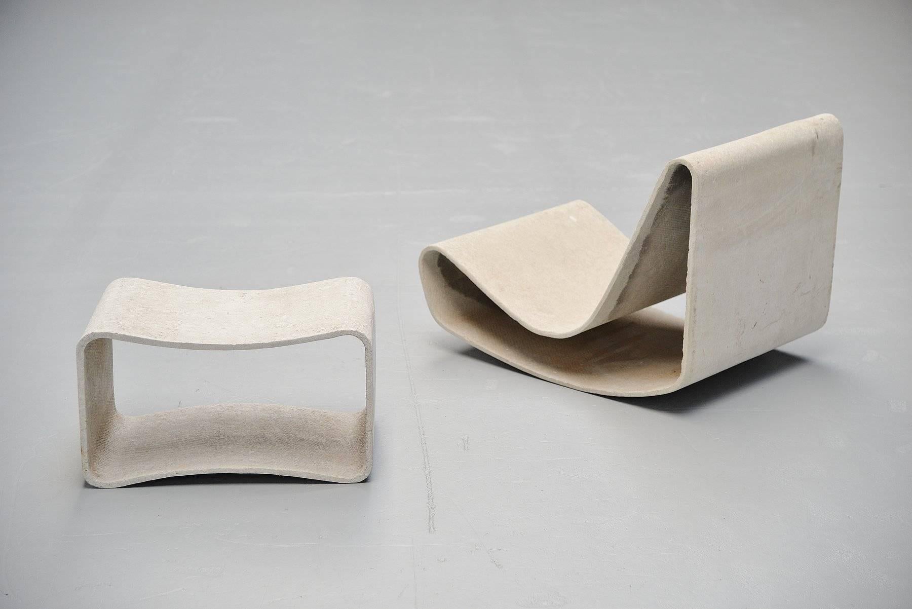 Very nice garden set, loop chair and table designed by Willy Guhl for Eternit, Switzerland, 1954. This chair and table was made of cellulose infused fiber cement and is therefore very strong even when it would have a crack it will not fully break
