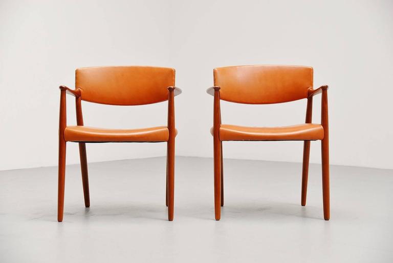 Very nice and rare pair of armchairs designed by architects Ejnar Larsen and Aksel Bender Madsen produced by cabinet maker Willy Beck Copenhagen, Denmark, 1951. These very nice crafted armchairs have a solid teak frame that is fully refinished and