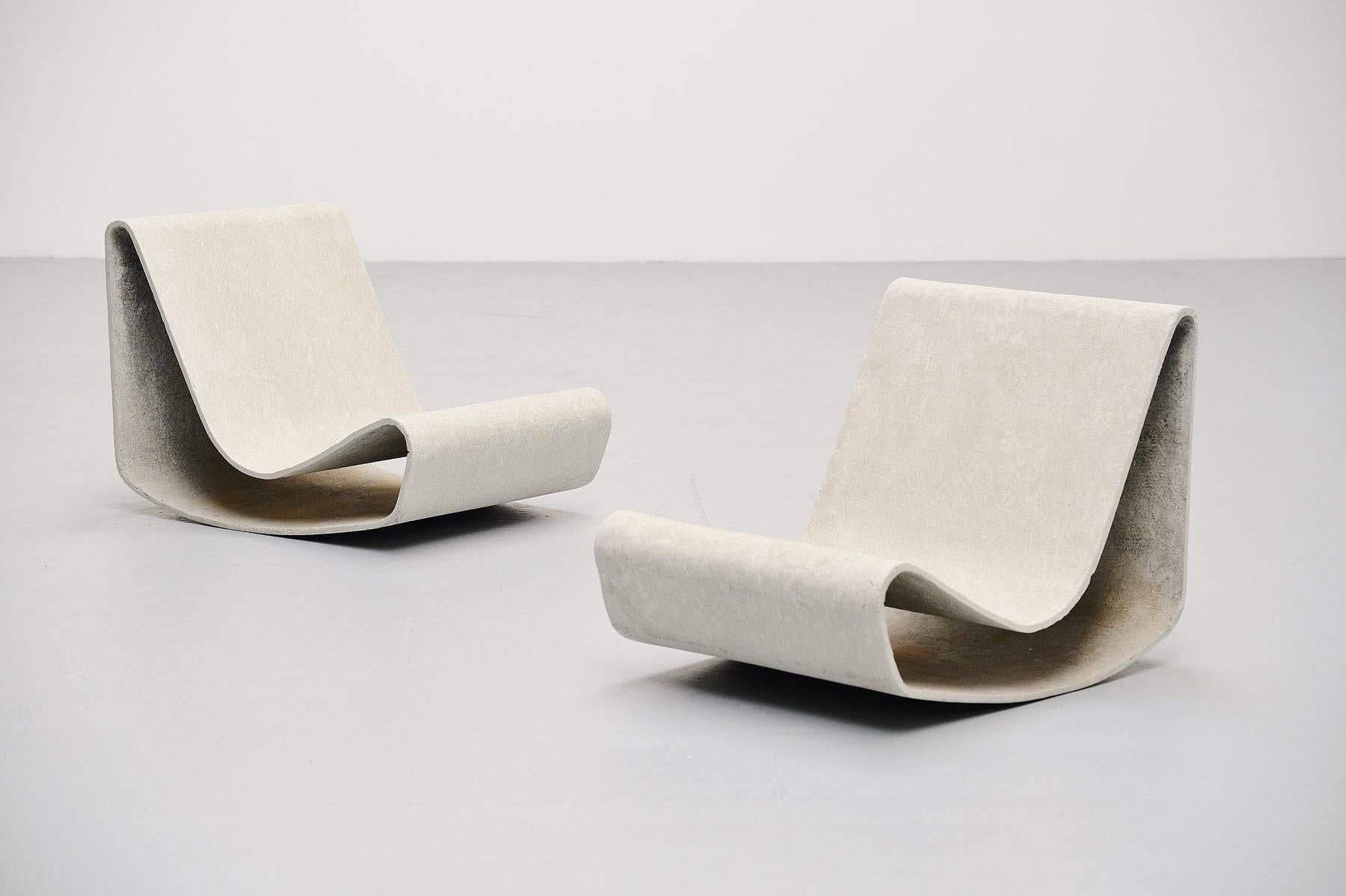 Very nice set of loop chairs designed by Willy Guhl for Eternit, Switzerland, 1954. These chairs were made of cellulose infused fiber cement and are therefore very strong even when one would have a crack it will not fully break because of its