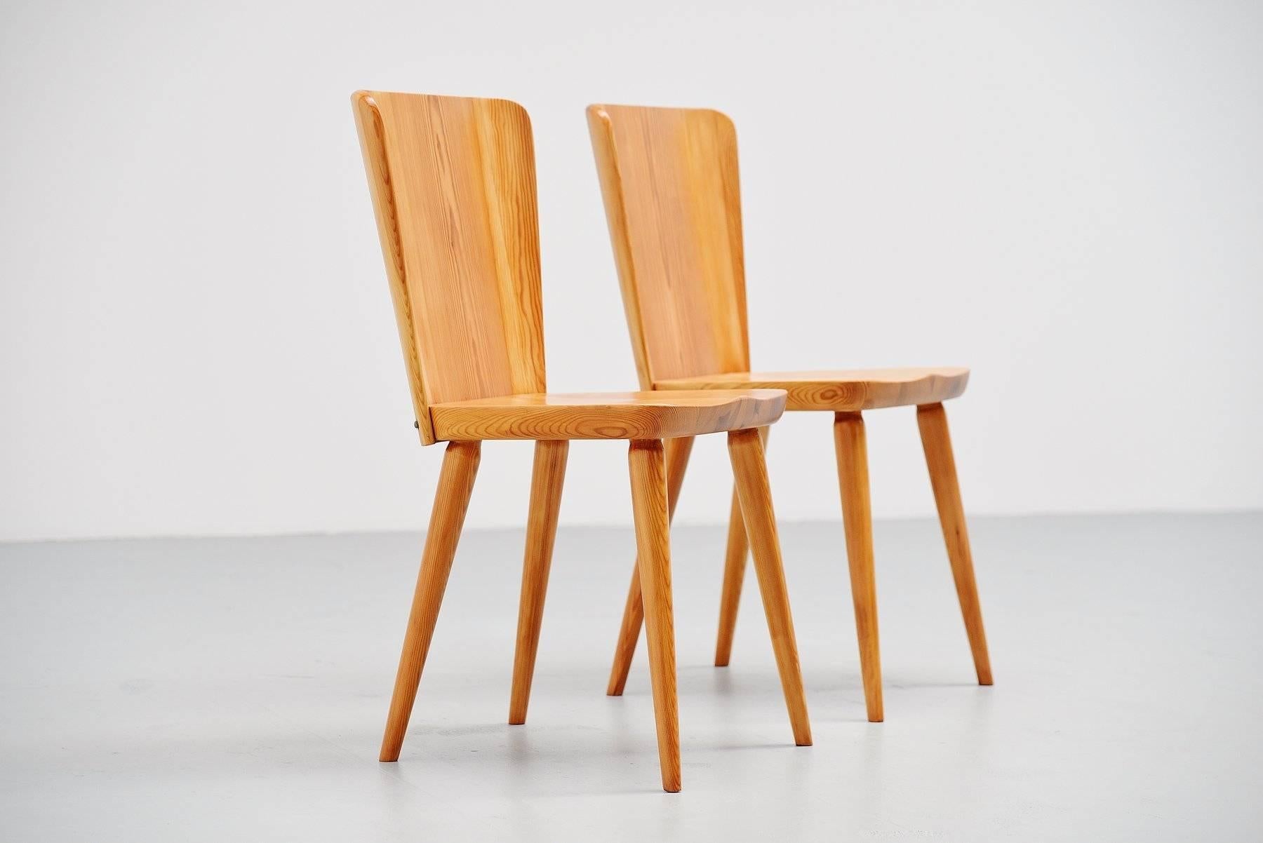 Very nice superbly crafted side chairs designed by Carl Malmsten for Svensk Fur - Karl Andersson and Soner, Sweden, 1940. These chairs are made of solid pinewood and are crafted into perfection. The connections on the seat and back are very