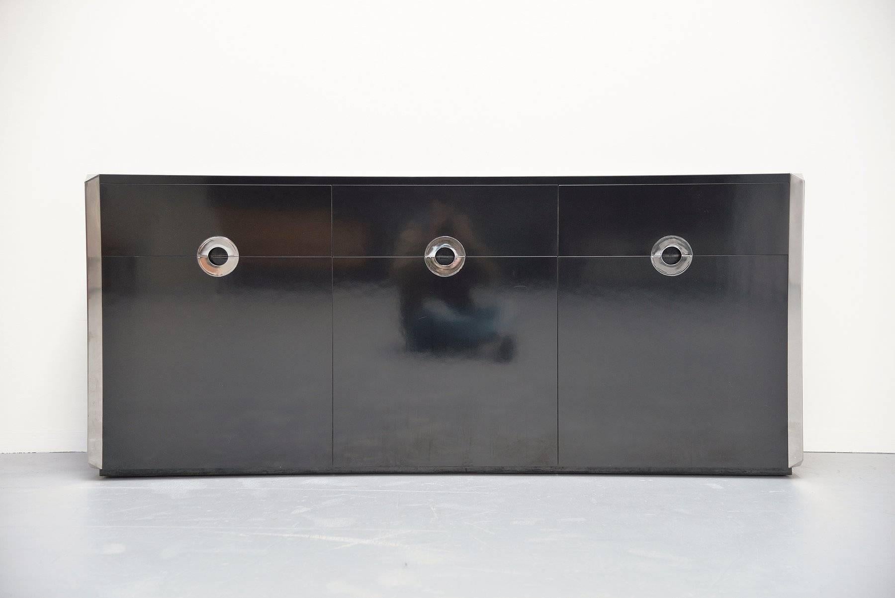 Nice modern credenza designed by Willy Rizzo for Mario Sabot, Italy, 1972. This superb quality sideboard is made of black laminated wood, in and outside; even the back is finished so you can use this as room divider too. The chrome parts are a great