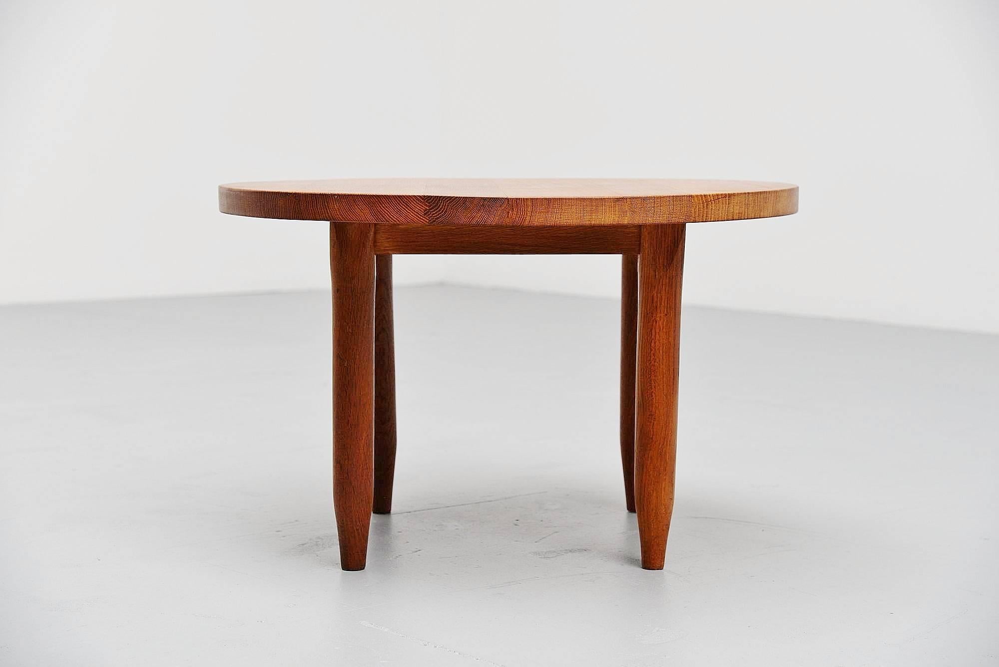 Very nice Forme Libre coffee table in the style of Charlotte Perriand and Pierre Chapo, France, 1950. This solid oak coffee table was bought just along the French border and has very nice details if you have a good look. Close to the works of