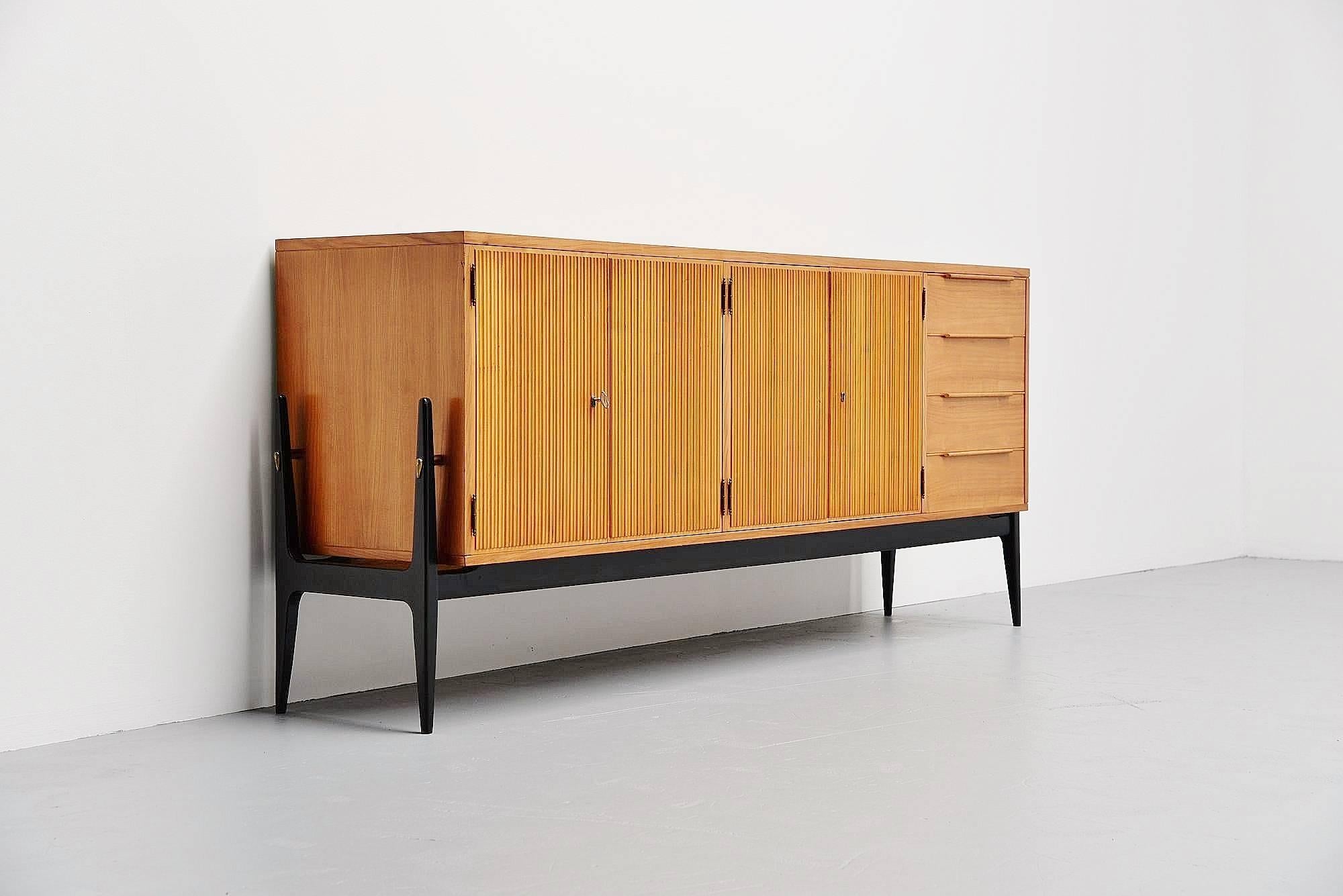 Here for a very nice sideboard often sold as an Alfred Hendrickx design, while in fact this is made by De Coene, Belgium, 1950. And Alfred Hendrickx never worked for de Coene. So the designer is unknown to me but is very beautifully made. This has a