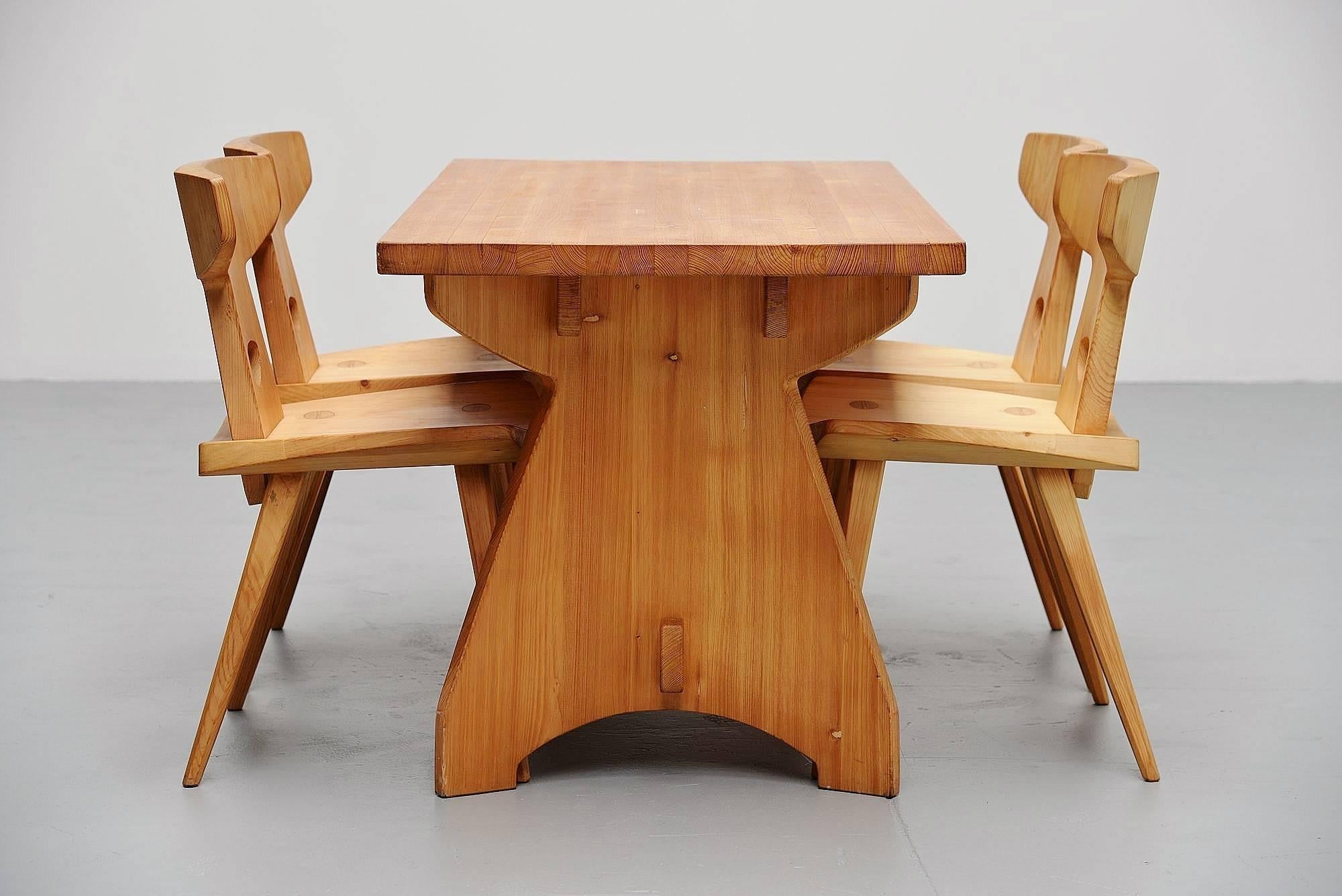 Fantastic set of four chairs and table designed by Jacob Kielland-Brandt, manufactured by I. Christiansen, Denmark, 1960. The designer won the Cabinetmaker Guild price in Denmark, 1960. Super handcrafted chairs and table in solid pine wood. Amazing