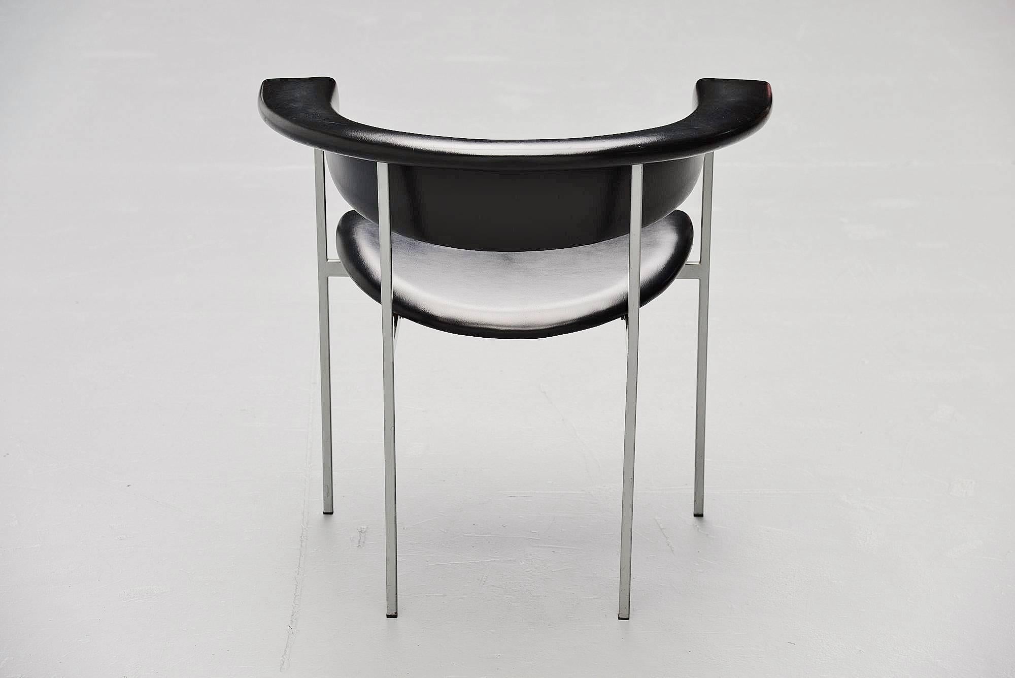 Iconic Dutch industrial design armchair model Meander Gamma designed by Rudolf Wolf, manufactured by Gaasbeek en van Tiel, Holland, 1962. This chair has a square tubular metal frame and black faux leather upholstery. This chair came from first owner