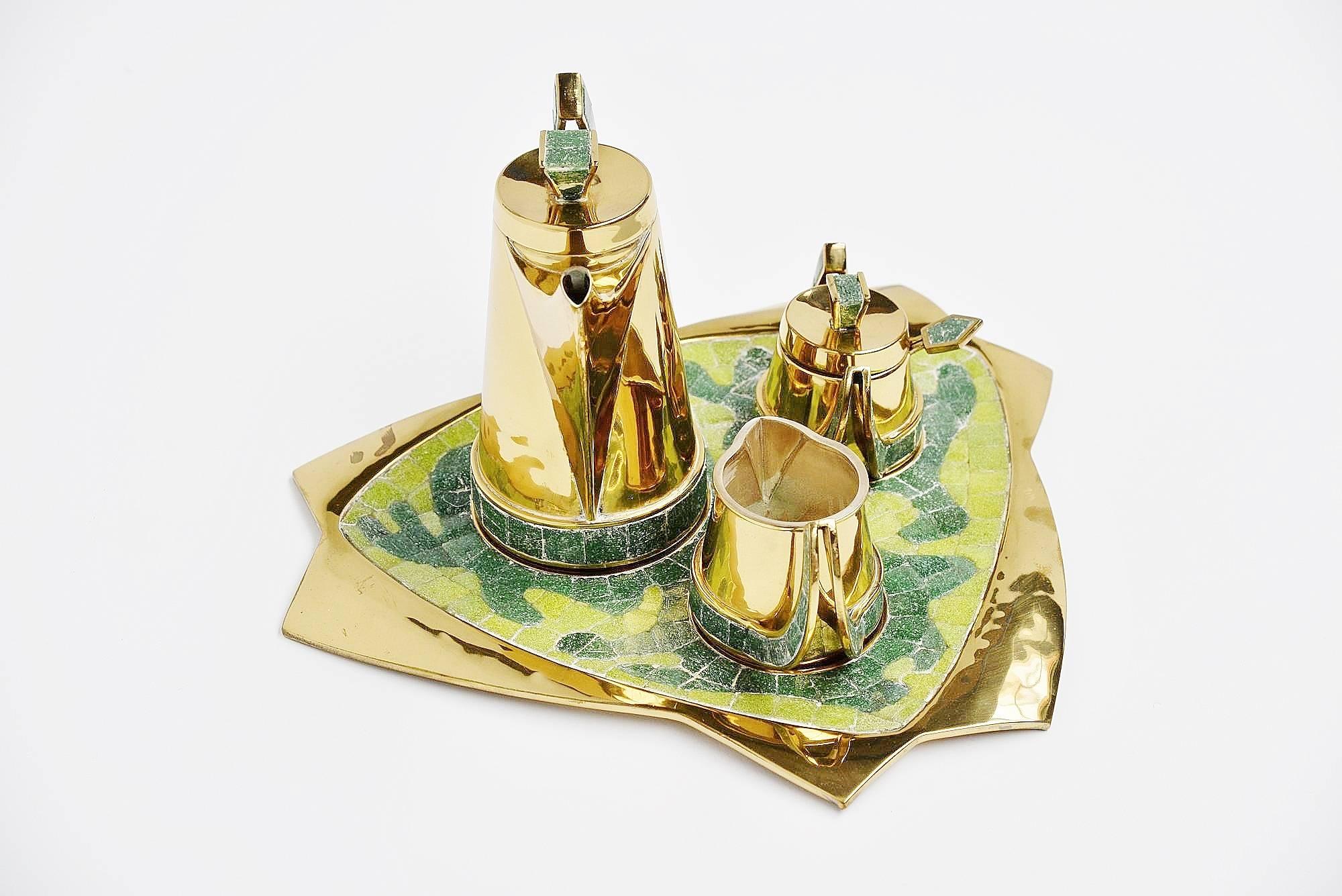 Super nice brass and mosaic tea set designed by Salvador Teran and handmade in Mexico, 1952. This beautiful tea seat was for sure inspired by the work of Salvador Gaudi. The set is superbly made and in very good (still shiny and clean) condition.