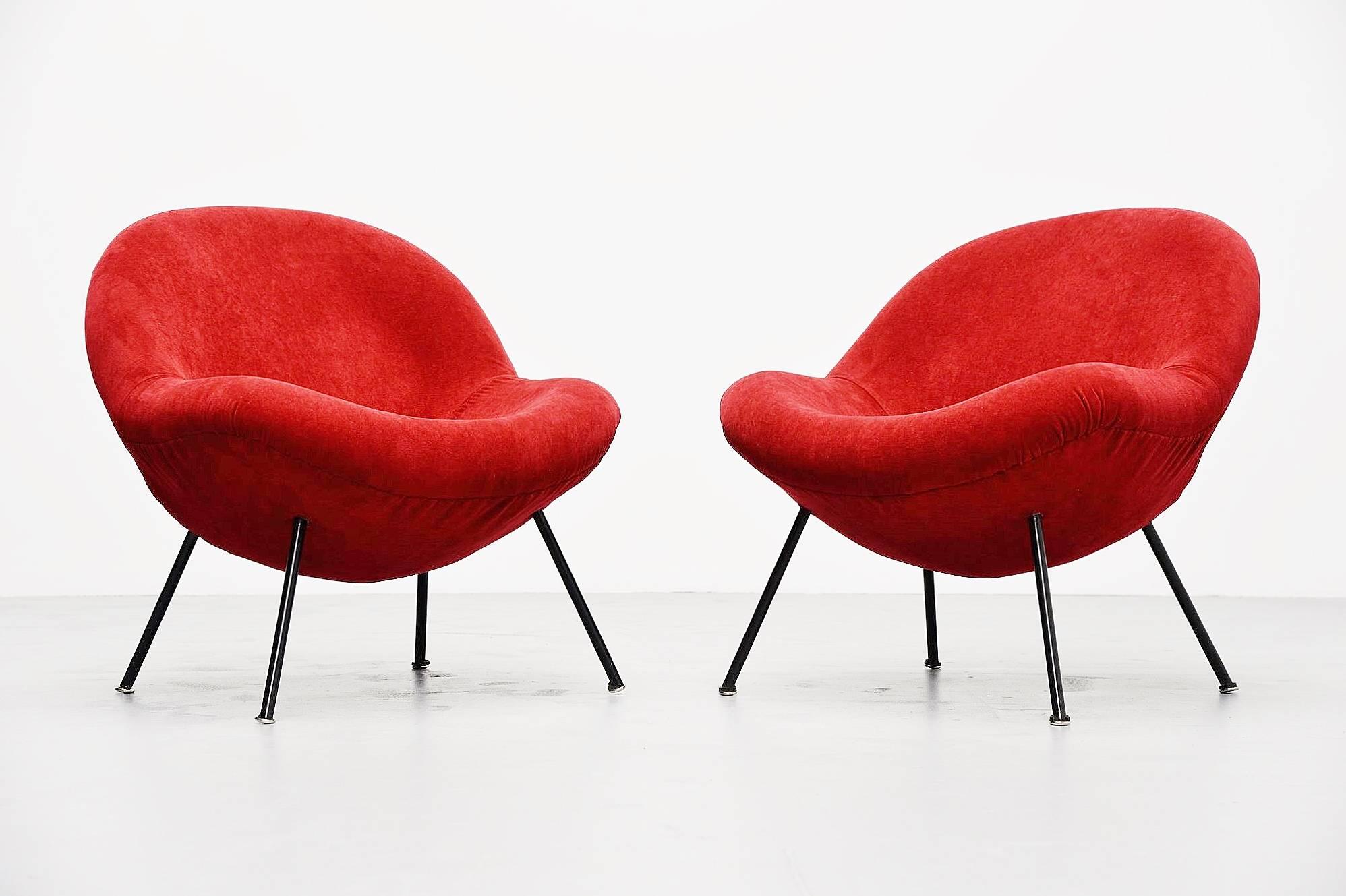 Comfortable pair of egg chairs designed by Fritz Neth, manufactured by Sitzformbau, Kassel Germany 1955. These chairs have a black lacquered metal structure filled with a foam seat and covered with red velvet upholstery. The chairs seat very